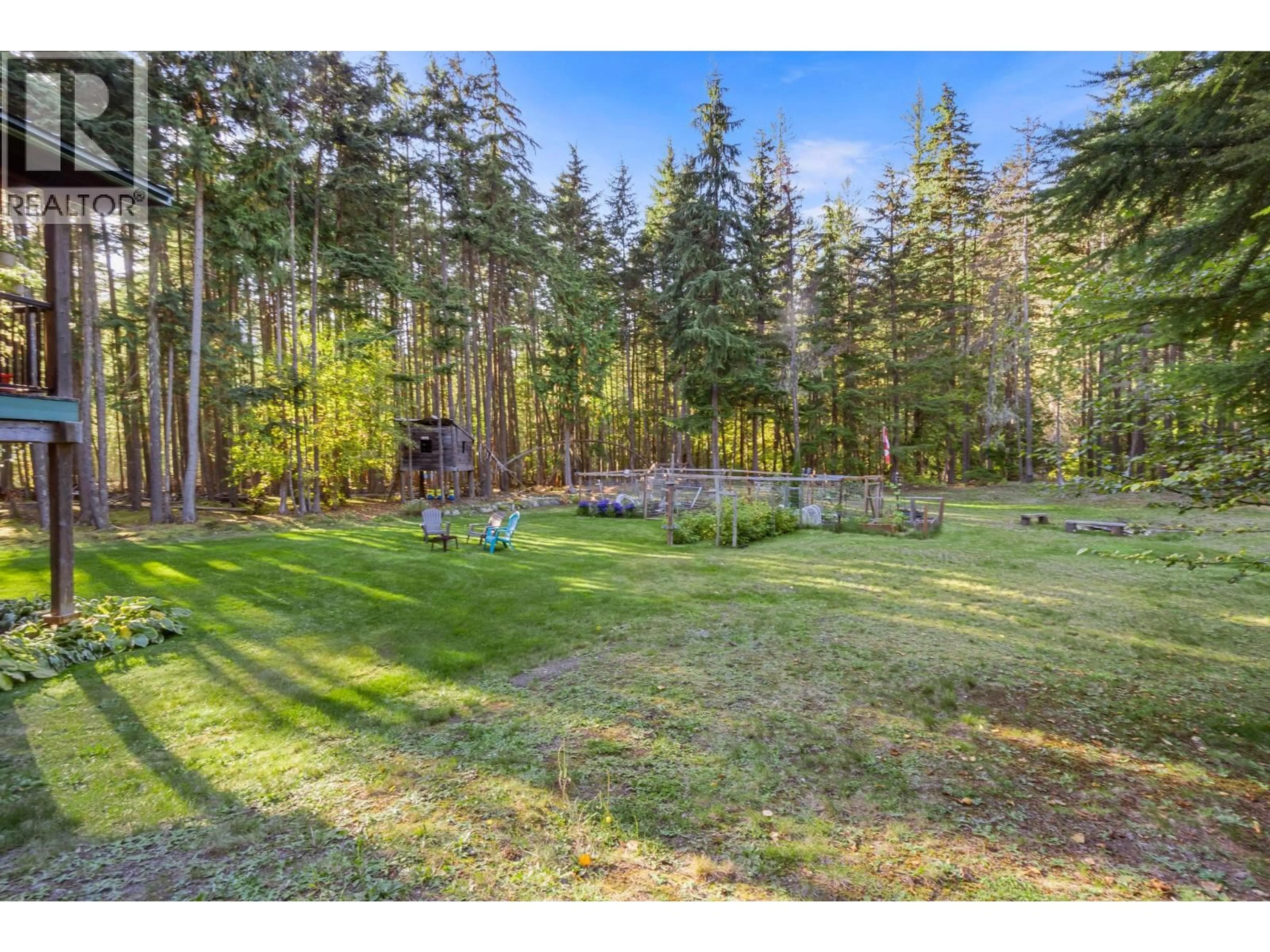 A pic from outside/outdoor area/front of a property/back of a property/a pic from drone, forest/trees view for 720 EAST WILSON CREEK ROAD, Rosebery British Columbia V0G1S1
