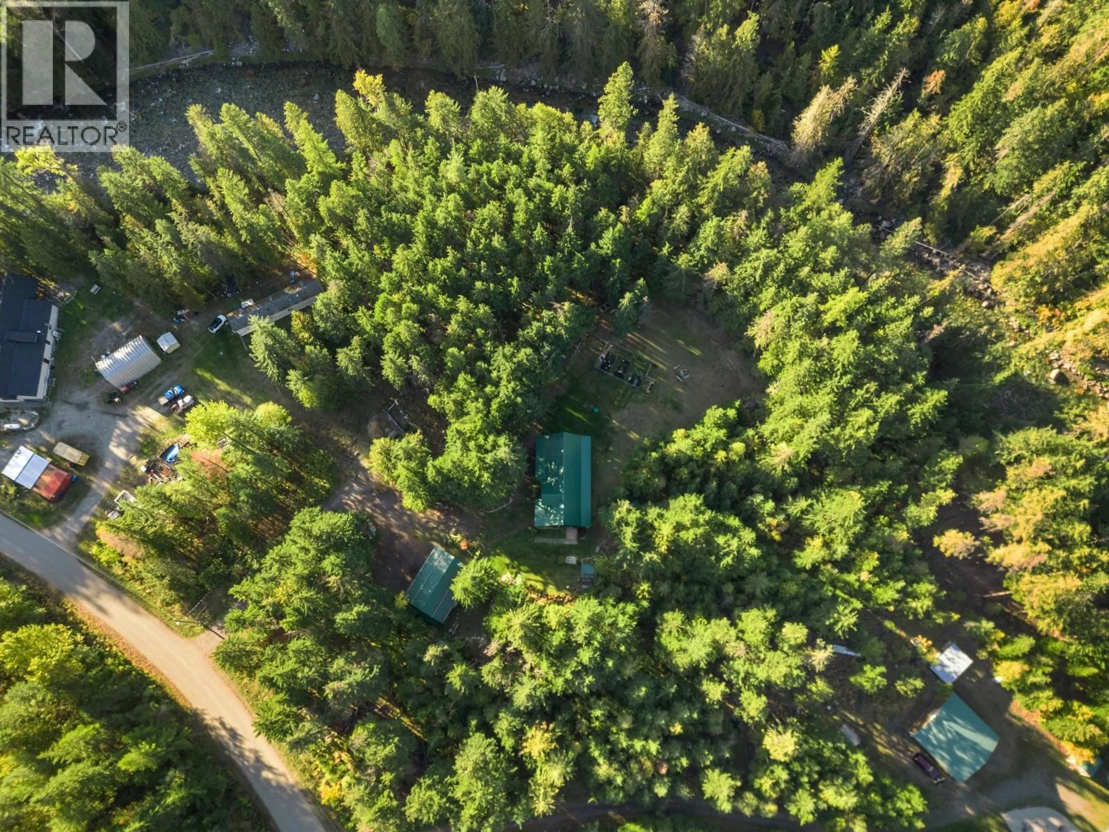 A pic from outside/outdoor area/front of a property/back of a property/a pic from drone, forest/trees view for 720 EAST WILSON CREEK ROAD, Rosebery British Columbia V0G1S1