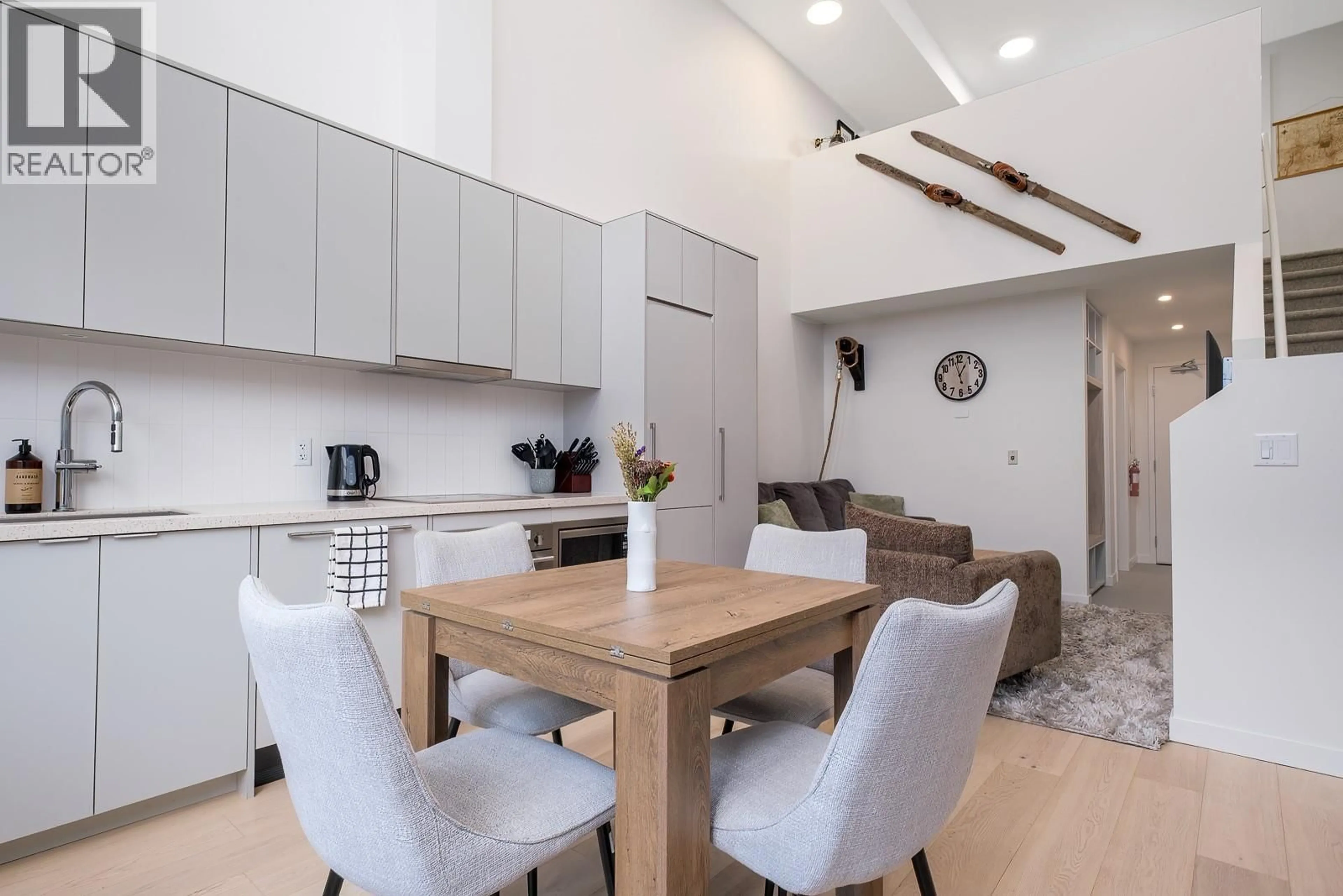 Open concept kitchen, wood/laminate floor for 405 - 4280 RED MOUNTAIN ROAD, Rossland British Columbia V0G1Y0
