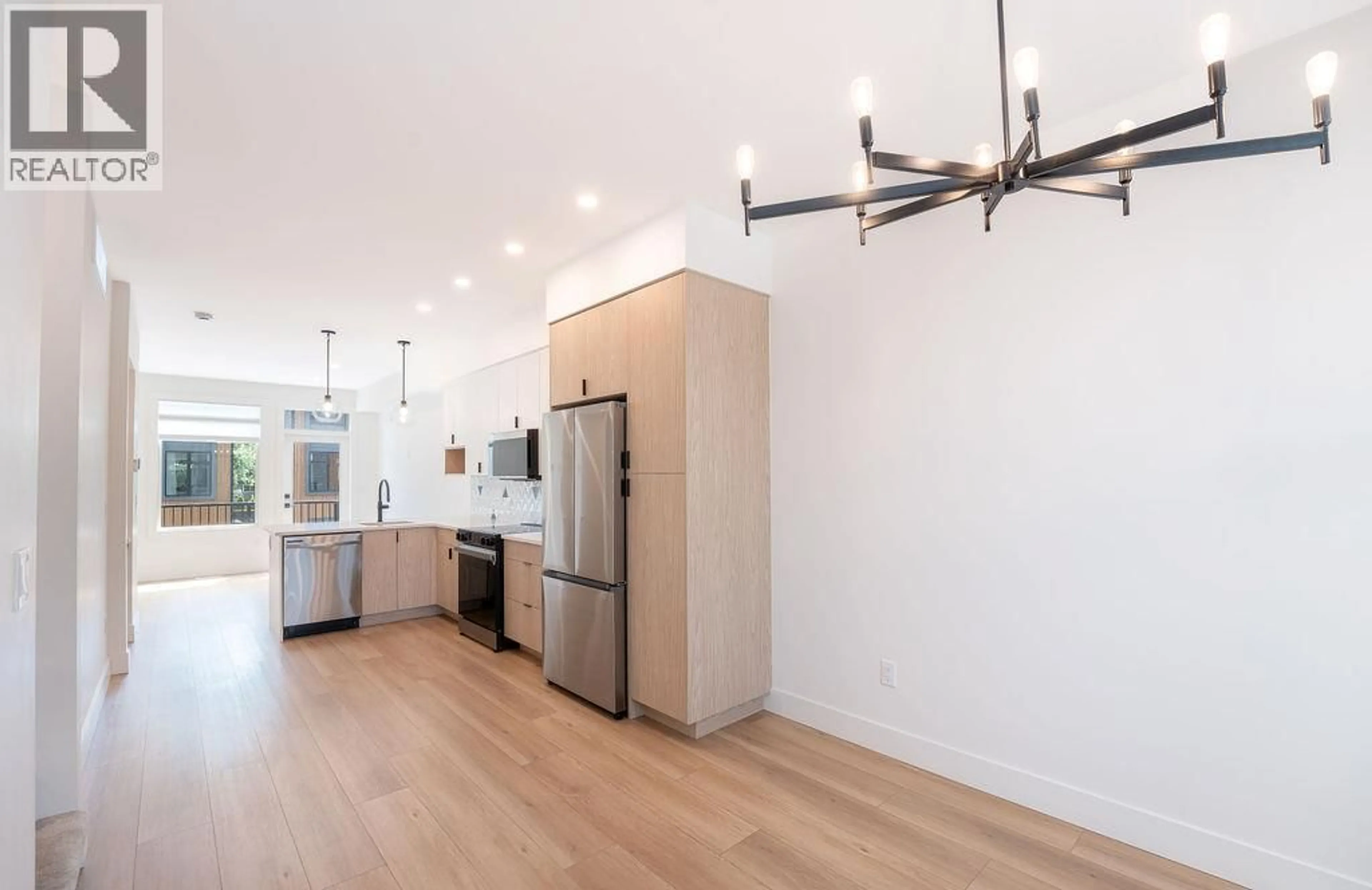 Open concept kitchen, wood/laminate floor for 4 - 414 HUMBERT STREET, Revelstoke British Columbia V0E2S0