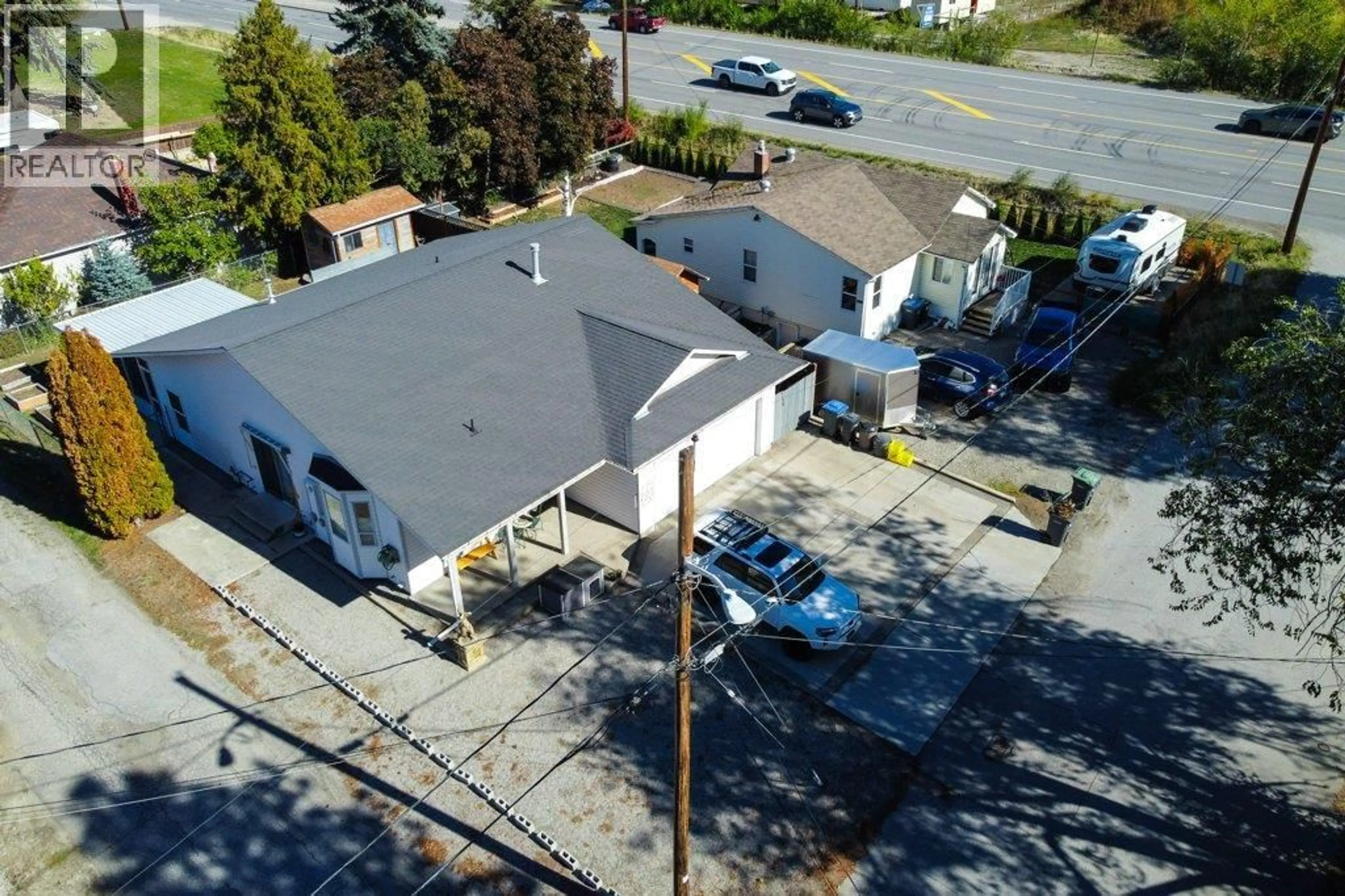 A pic from outside/outdoor area/front of a property/back of a property/a pic from drone, street for 9702 SARGEANT STREET, Summerland British Columbia V0H1Z3
