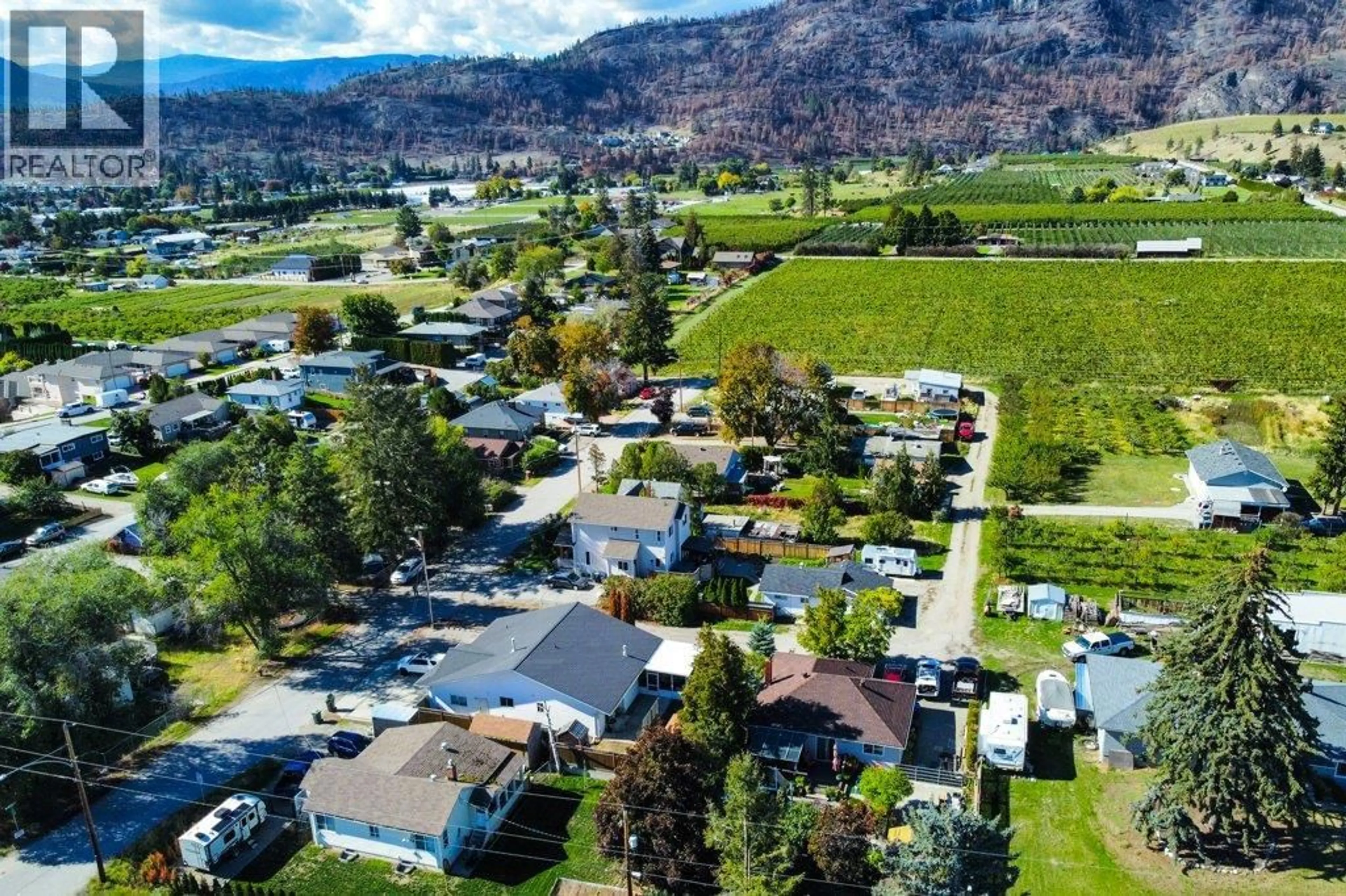 A pic from outside/outdoor area/front of a property/back of a property/a pic from drone, mountain view for 9702 SARGEANT STREET, Summerland British Columbia V0H1Z3