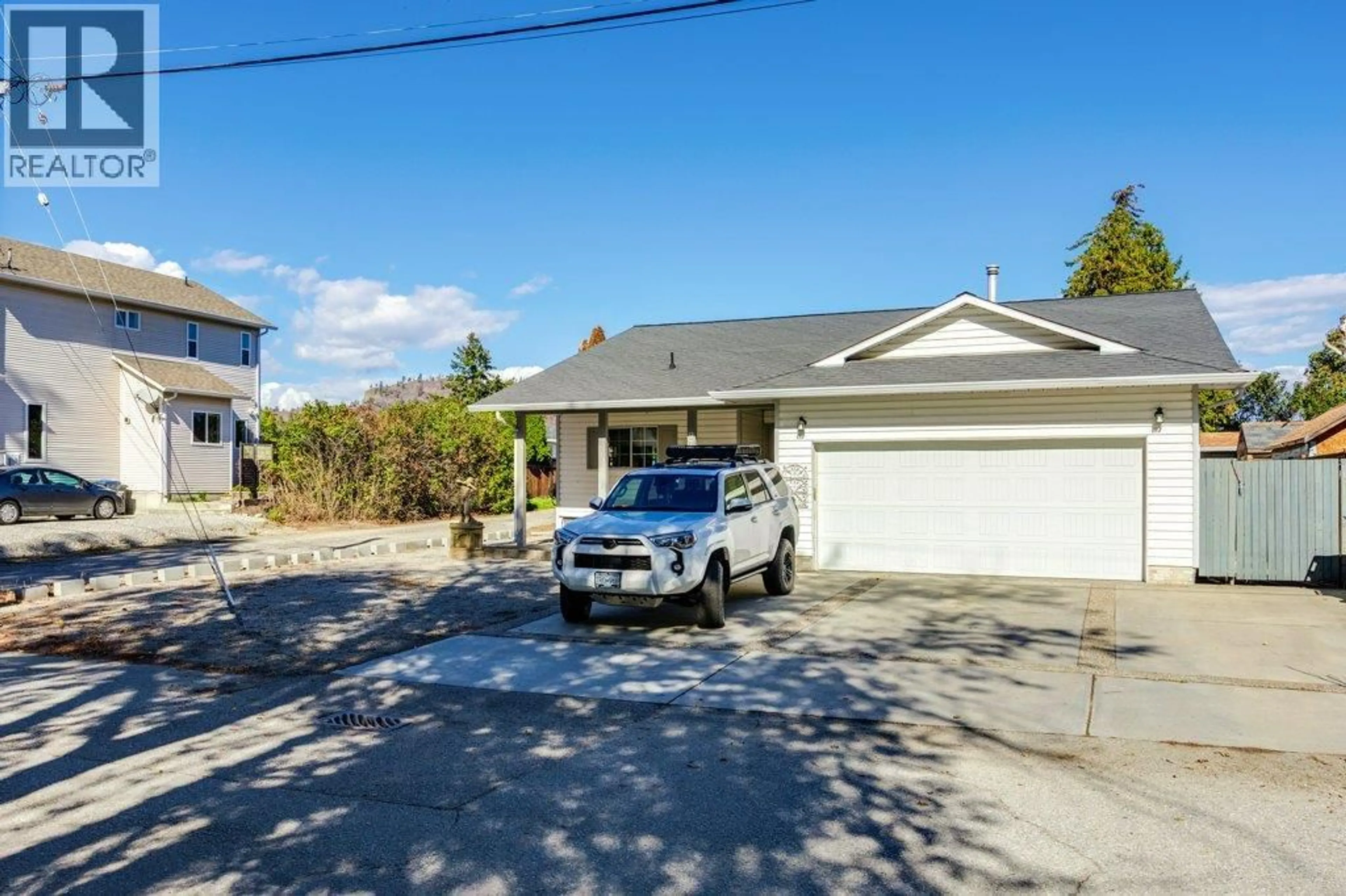 A pic from outside/outdoor area/front of a property/back of a property/a pic from drone, street for 9702 SARGEANT STREET, Summerland British Columbia V0H1Z3