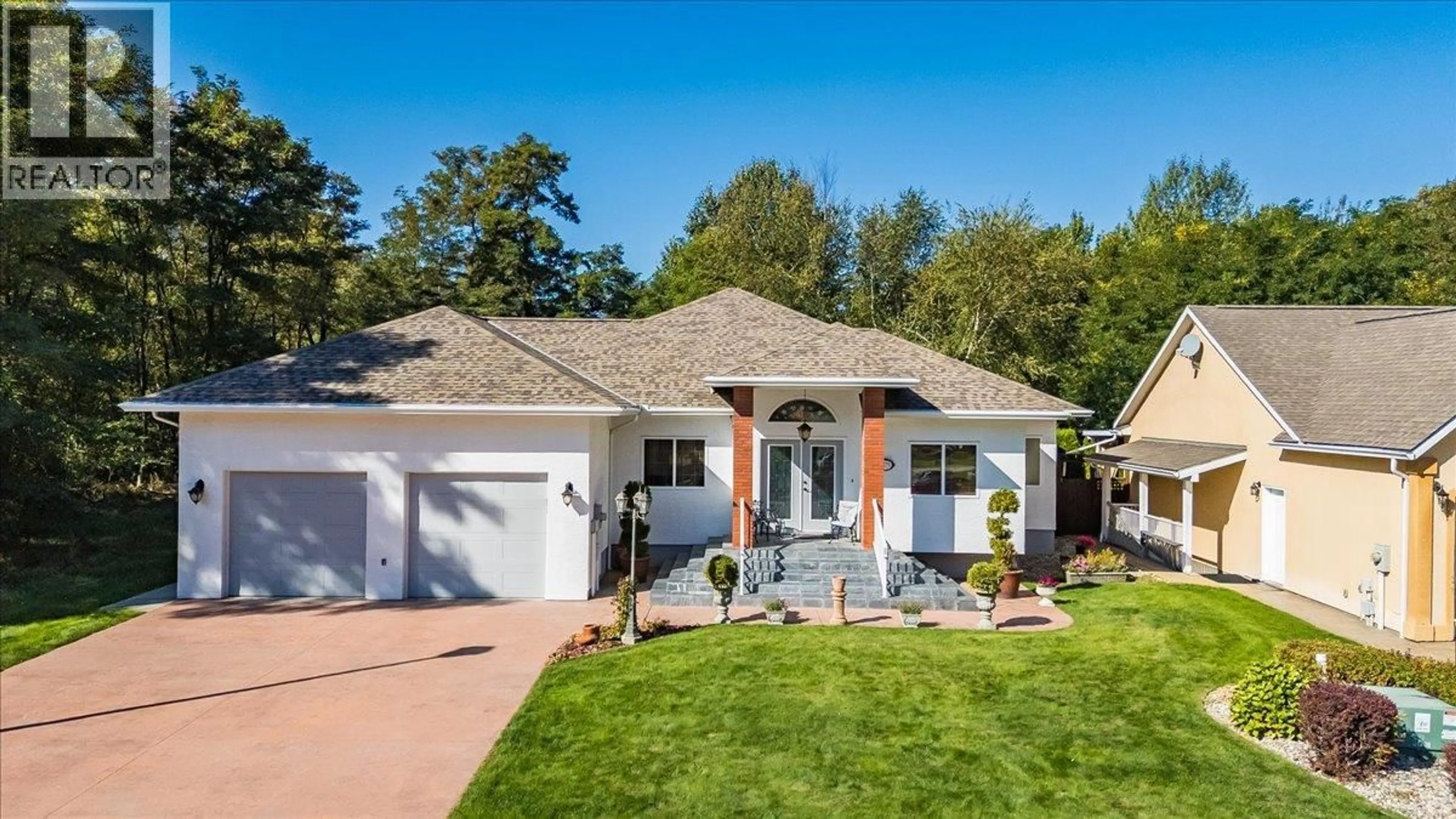 Home with vinyl exterior material, street for 1275 PAQUETTE DRIVE, Trail British Columbia V1R4W2