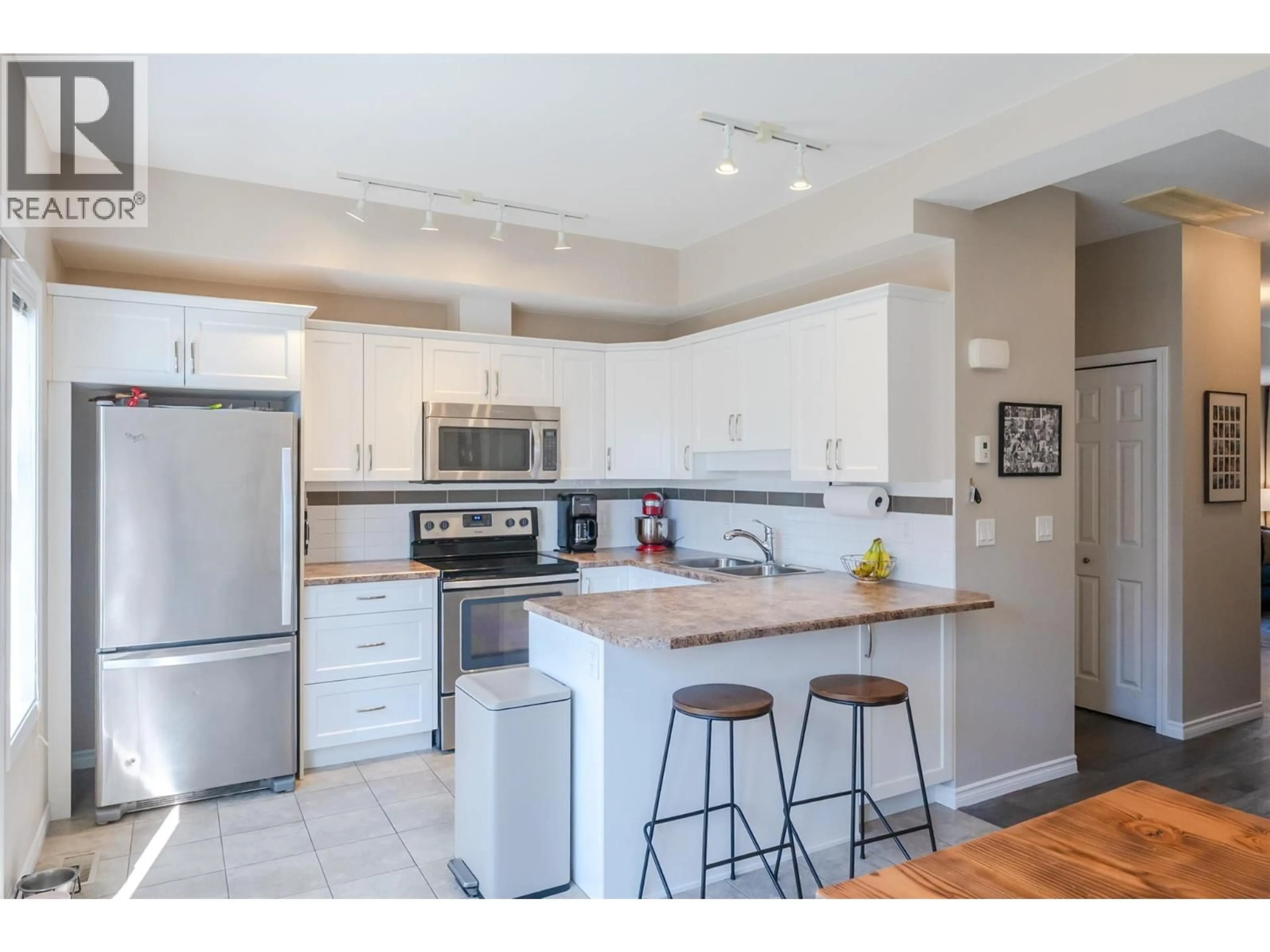 Open concept kitchen, unknown for 125 - 3363 WILSON STREET, Penticton British Columbia V2A9G7