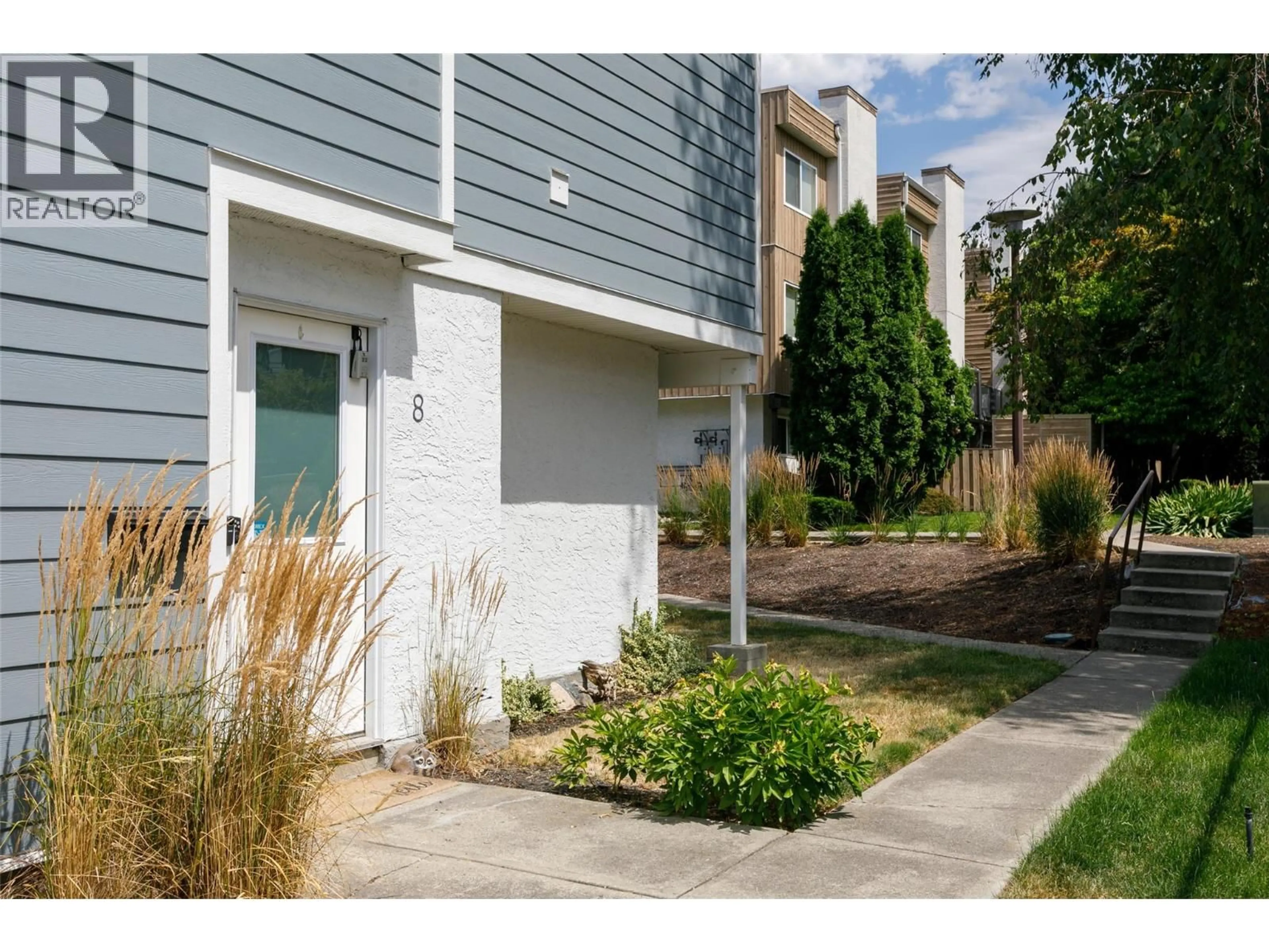 Home with vinyl exterior material, street for 8 - 1481 INKAR ROAD, Kelowna British Columbia V1Y8J1