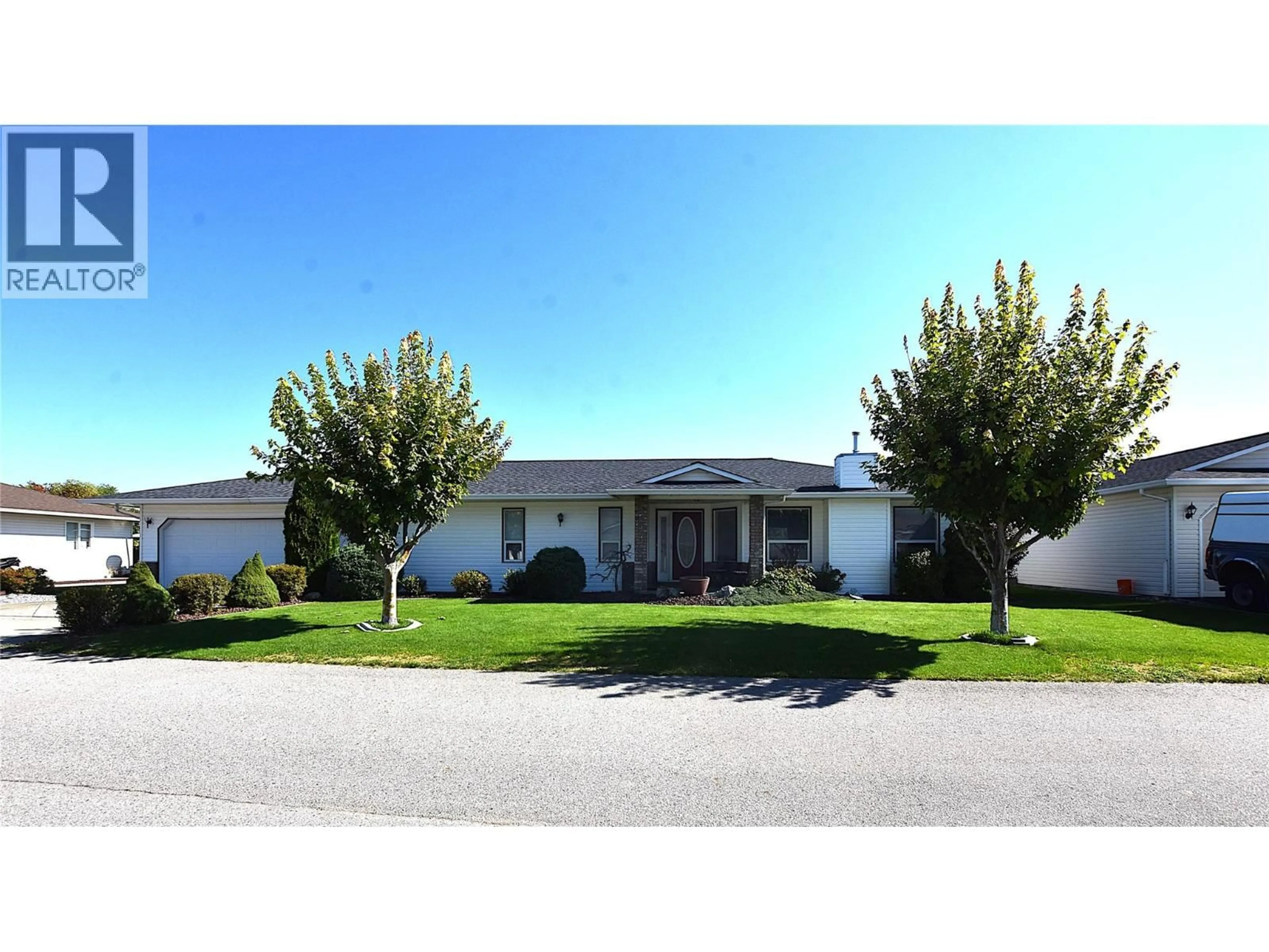 Home with vinyl exterior material, street for 415 4 STREET, Vernon British Columbia V1H1Z1