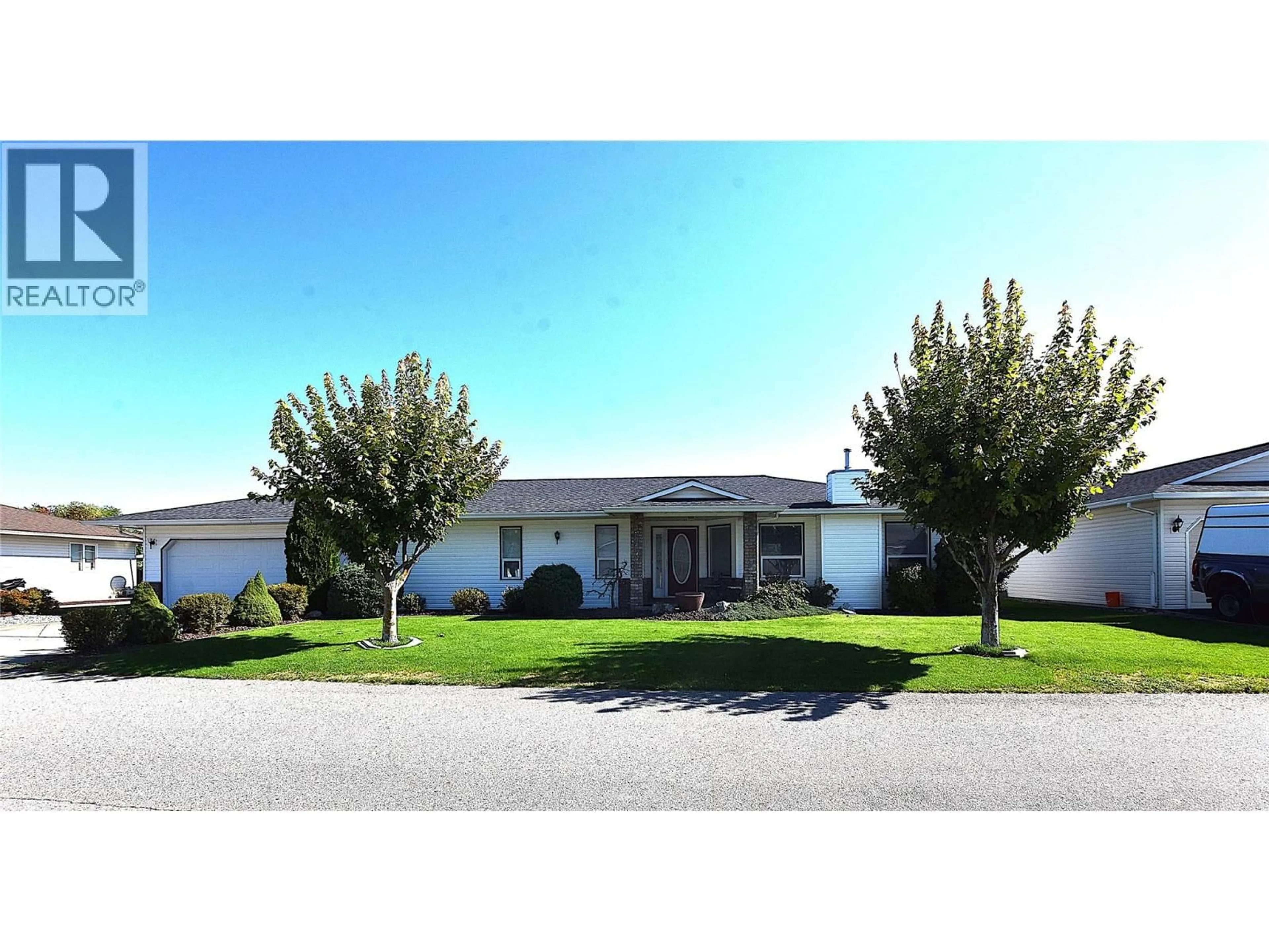 Home with vinyl exterior material, street for 415 4 STREET, Vernon British Columbia V1H1Z1
