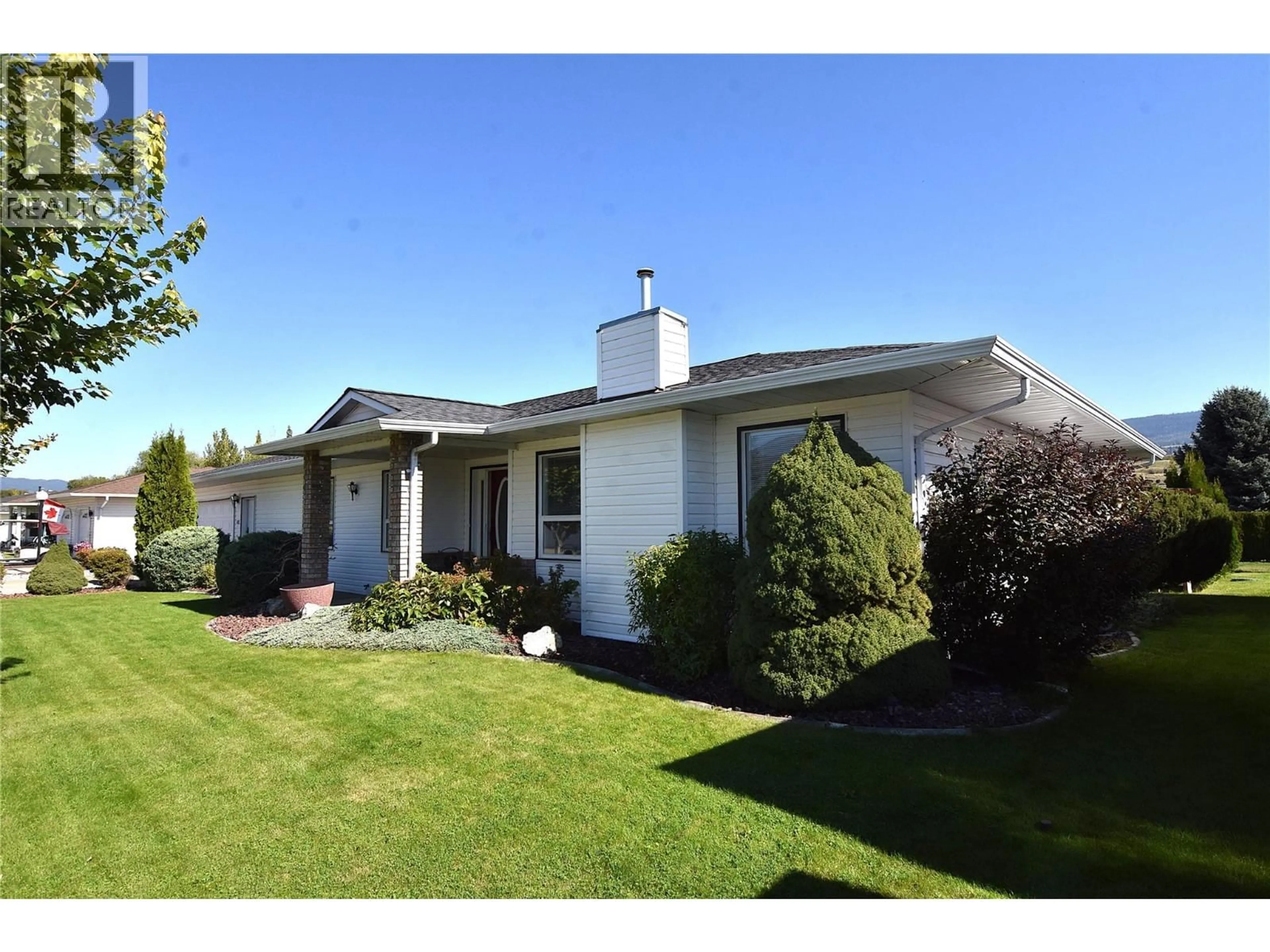 Home with vinyl exterior material, street for 415 4 STREET, Vernon British Columbia V1H1Z1