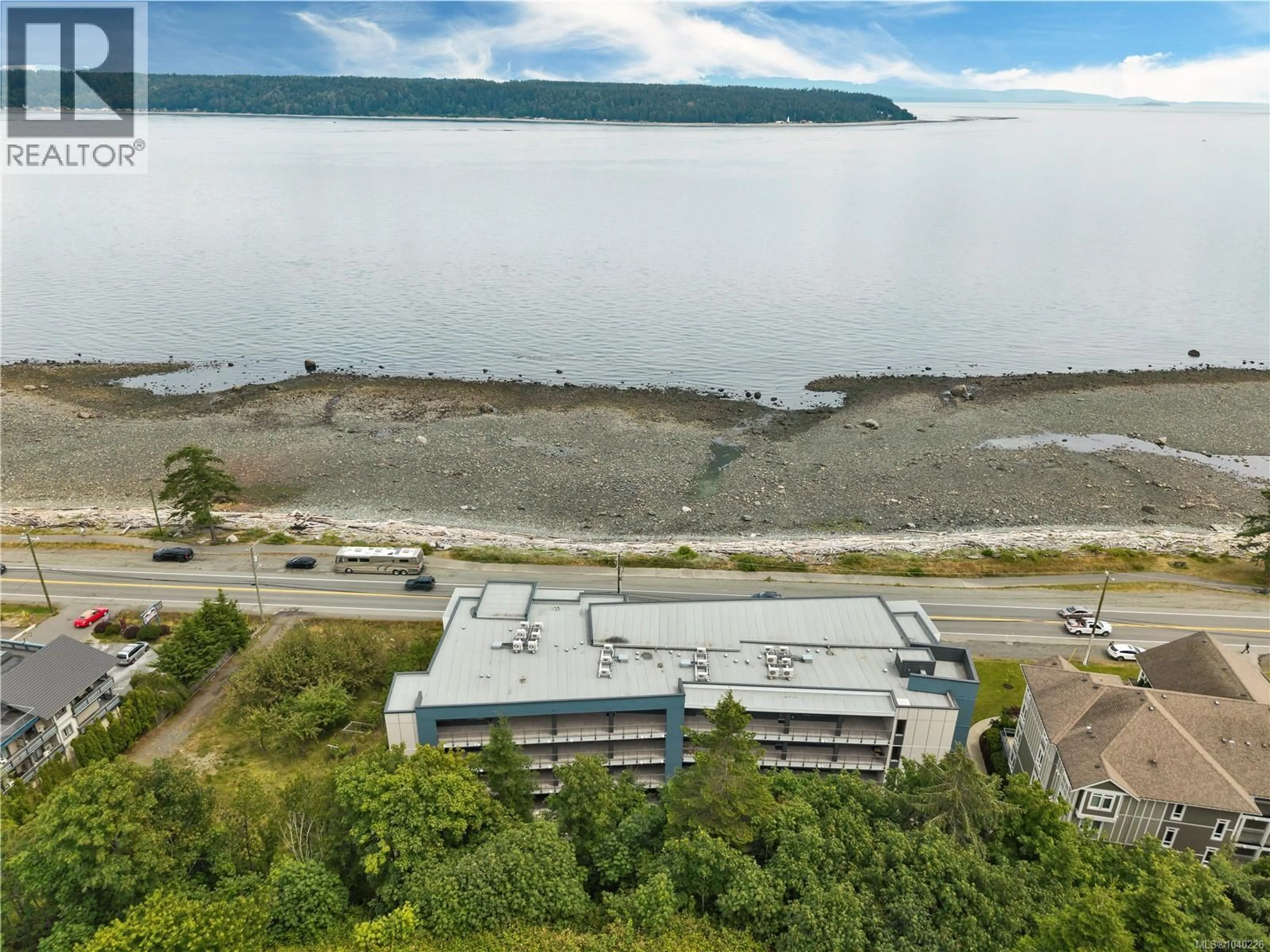 A pic from outside/outdoor area/front of a property/back of a property/a pic from drone, water/lake/river/ocean view for 404 - 536 ISLAND HIGHWAY SOUTH, Campbell River British Columbia V9W1A5