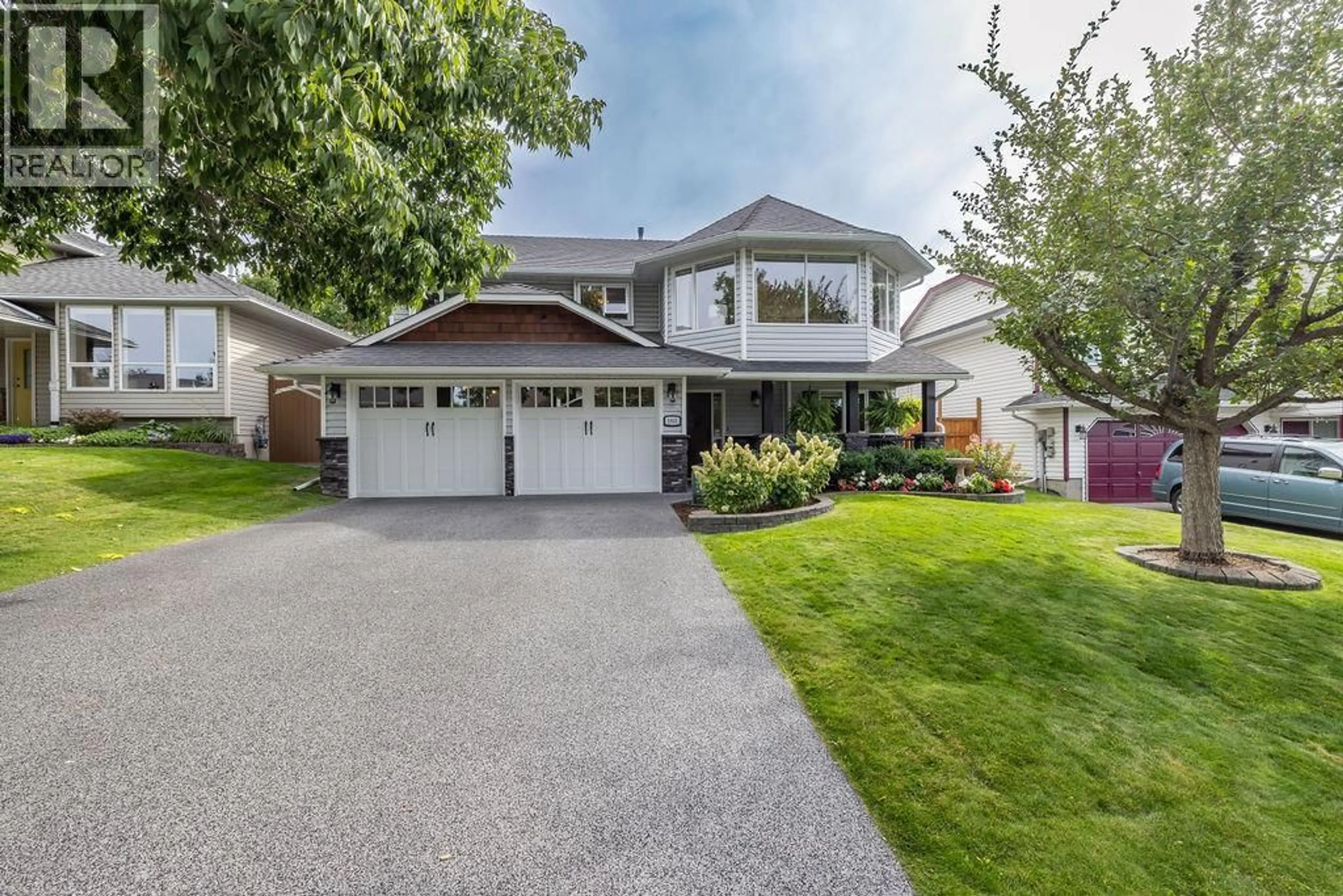 Home with vinyl exterior material, street for 1931 TINNISWOOD COURT, Kamloops British Columbia V2E2K5