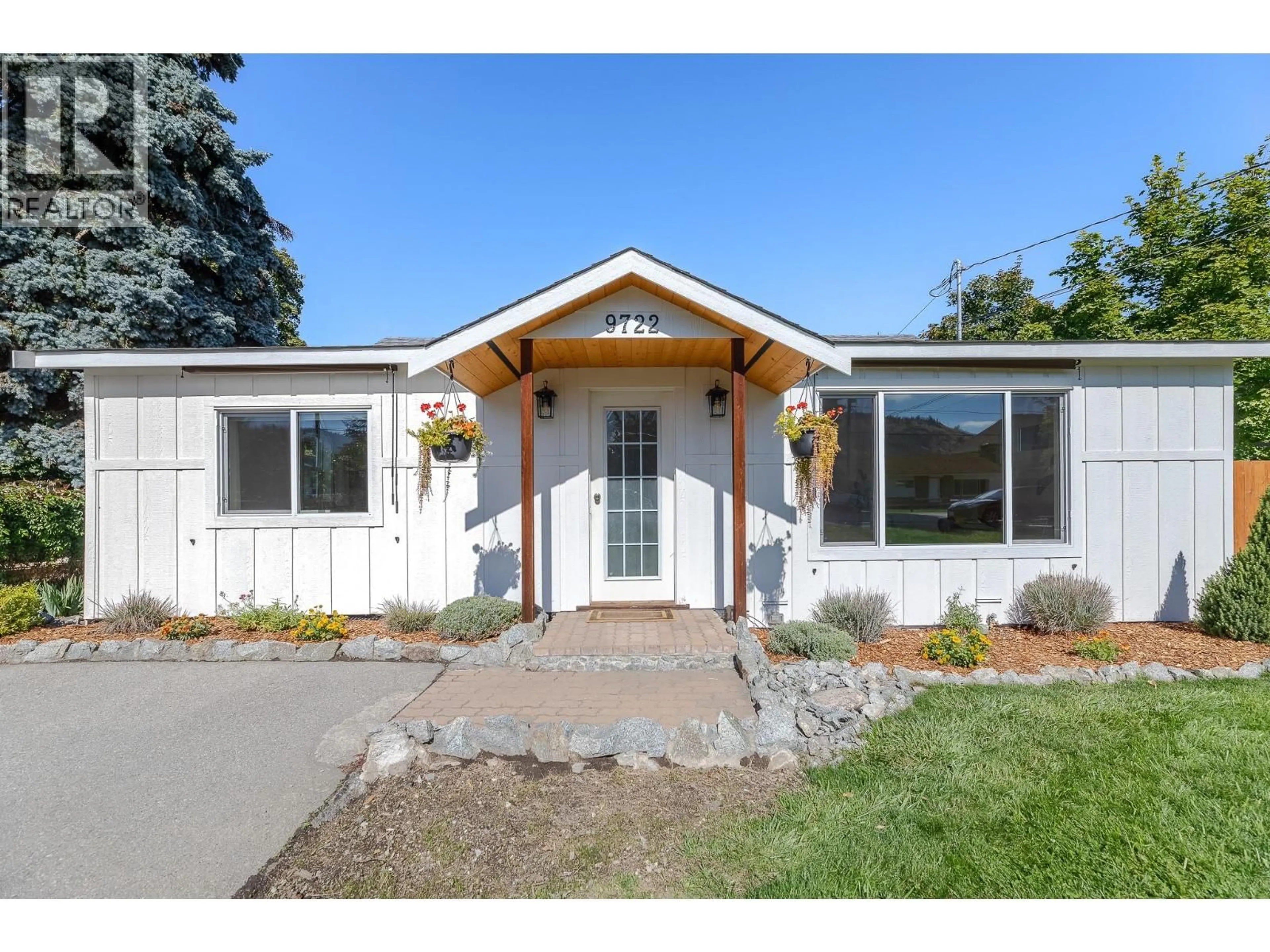 Home with vinyl exterior material, street for 9722 JULIA STREET, Summerland British Columbia V0H1Z5