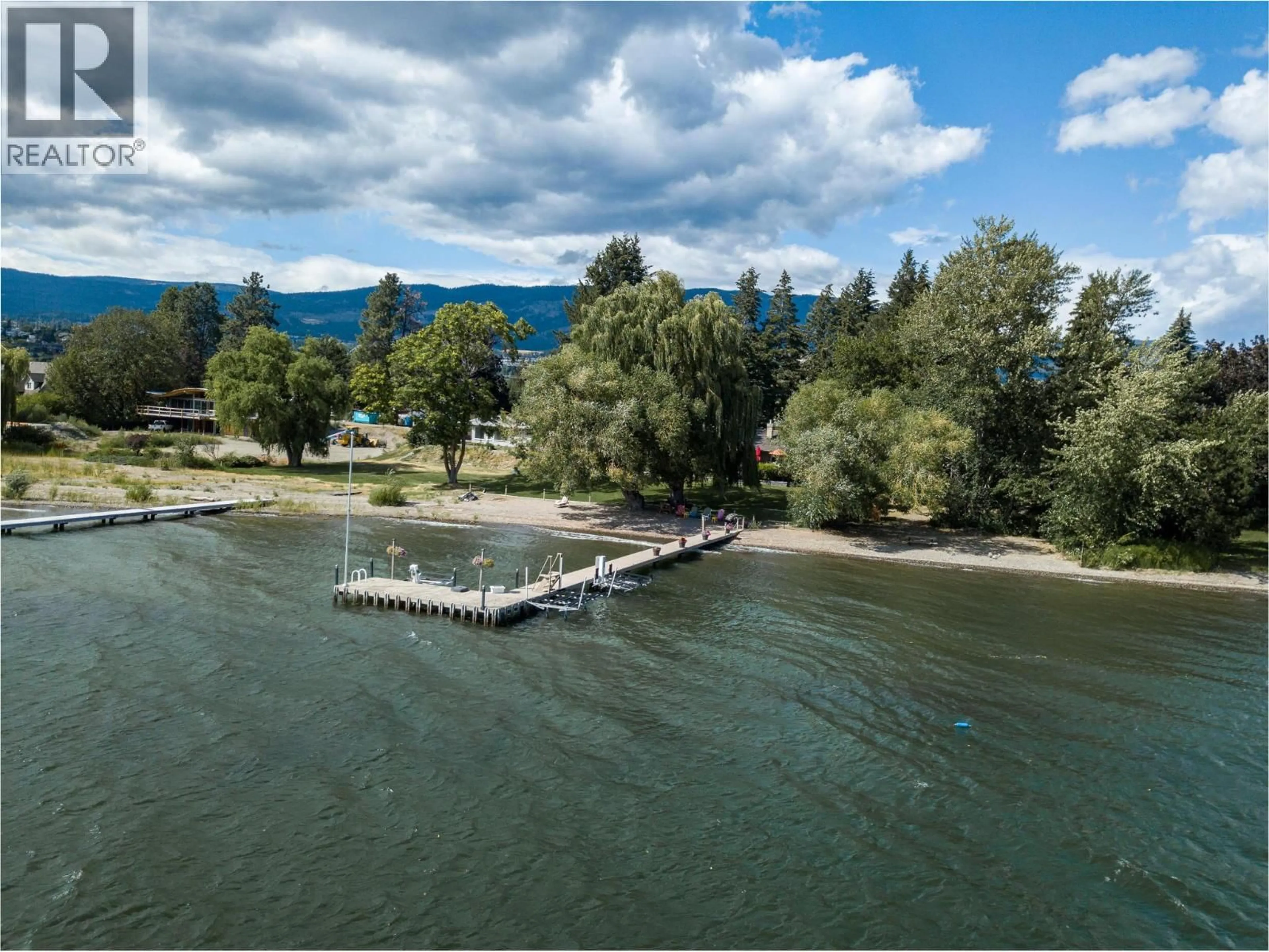 A pic from outside/outdoor area/front of a property/back of a property/a pic from drone, water/lake/river/ocean view for 1865 JENNENS ROAD, West Kelowna British Columbia V4T2C9