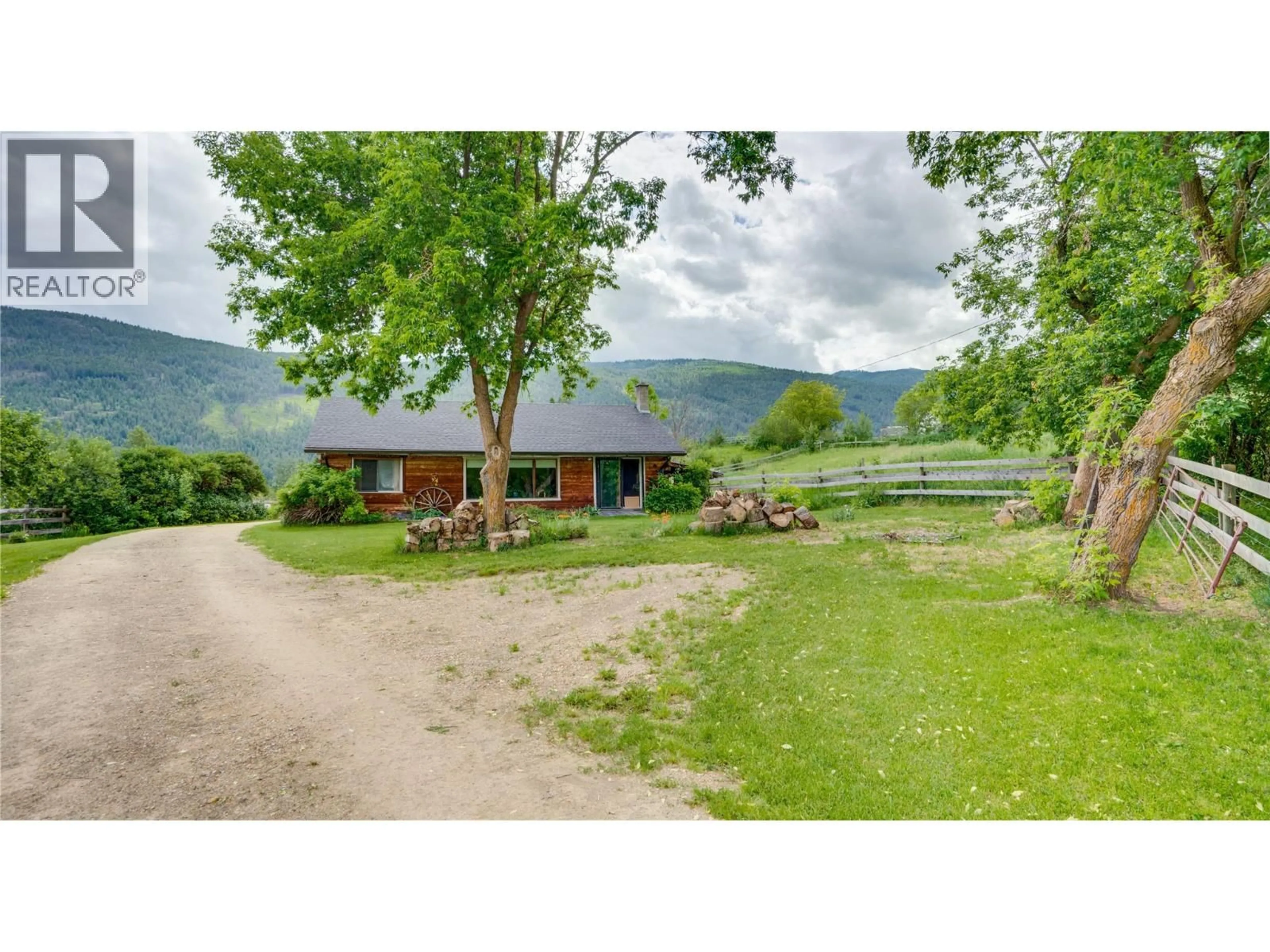 A pic from outside/outdoor area/front of a property/back of a property/a pic from drone, mountain view for 4878 STEPNEY ROAD, Spallumcheen British Columbia V4Y0R7