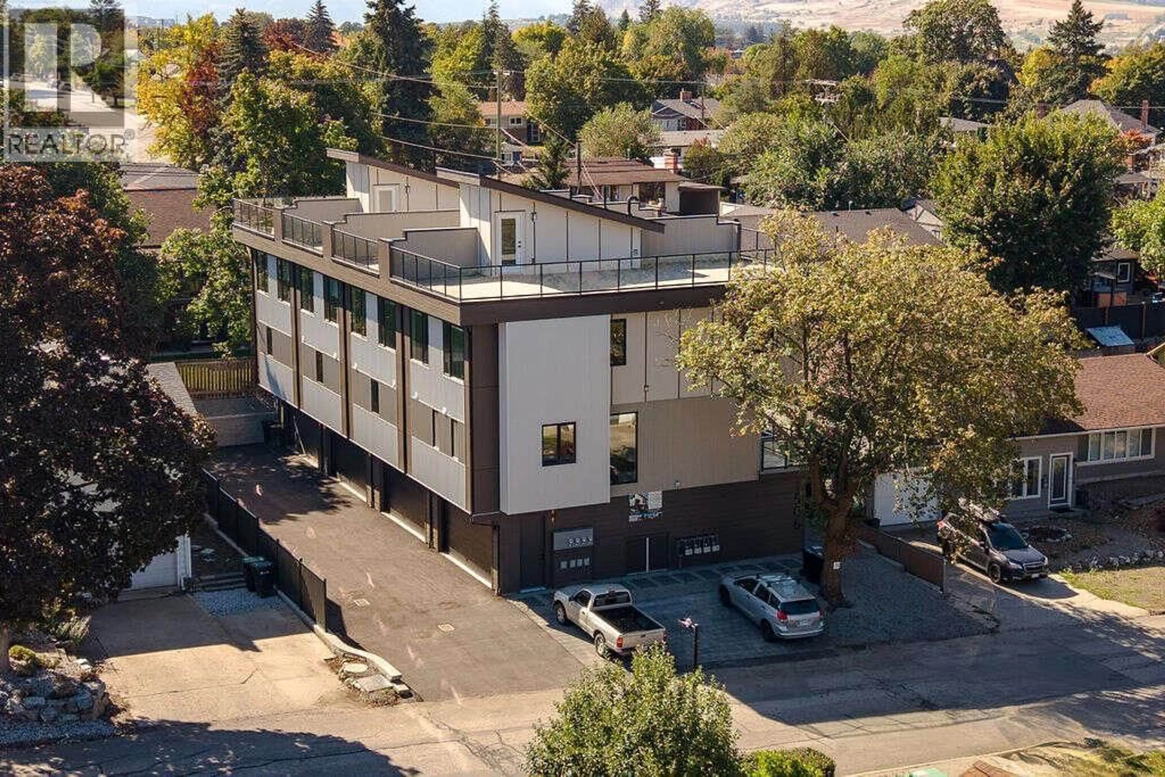 A pic from outside/outdoor area/front of a property/back of a property/a pic from drone, building for 1 - 1506 39A AVENUE, Vernon British Columbia V1Y7N2