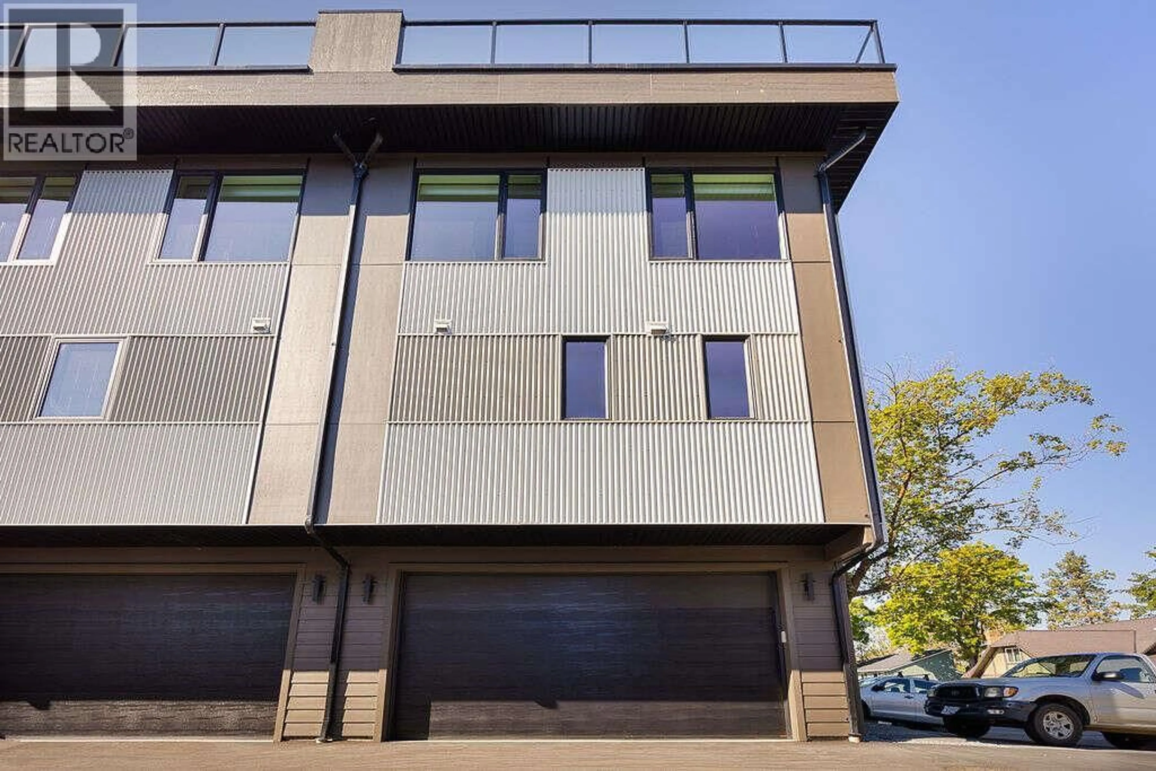 A pic from outside/outdoor area/front of a property/back of a property/a pic from drone, building for 1 - 1506 39A AVENUE, Vernon British Columbia V1Y7N2
