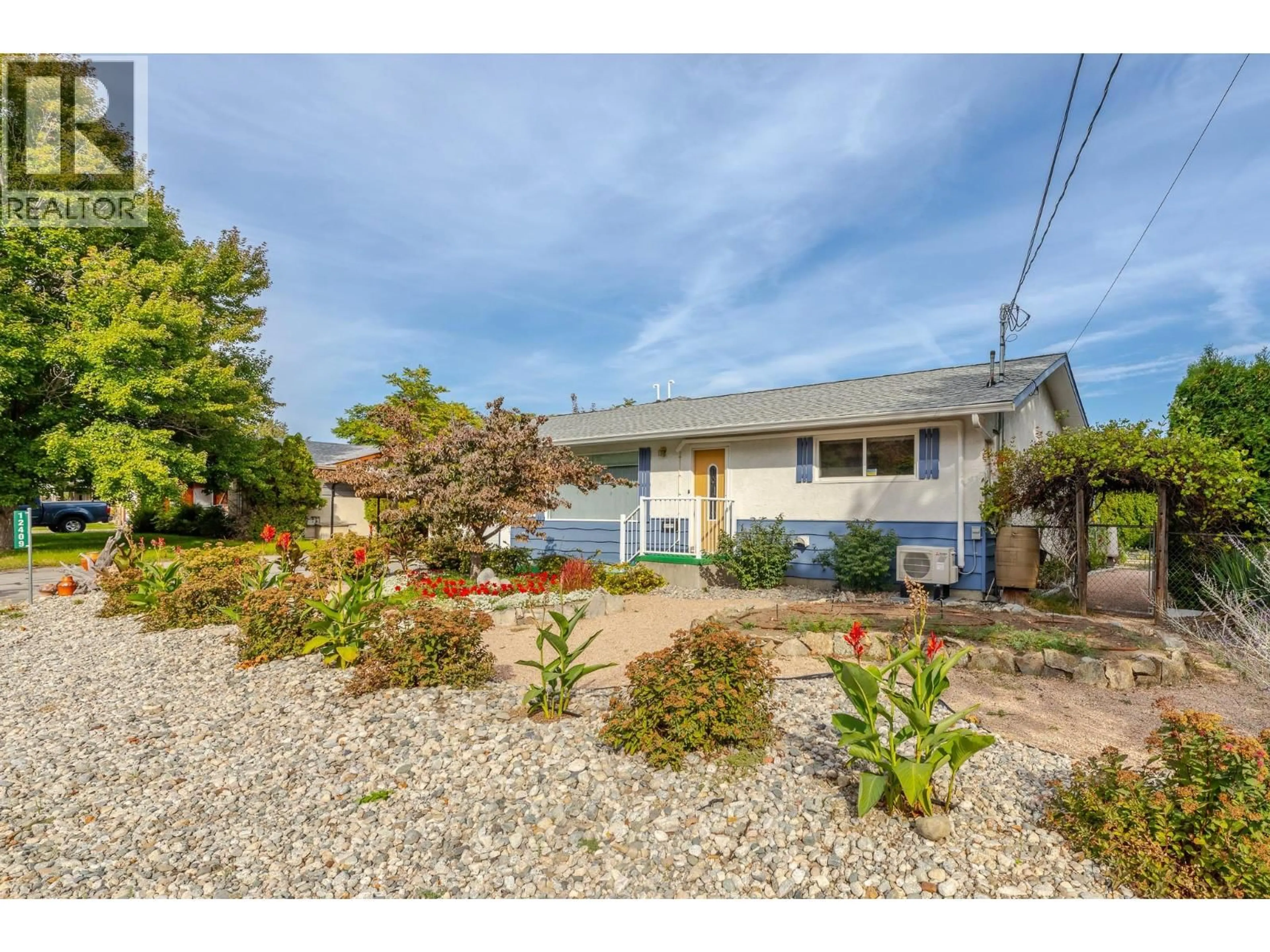 A pic from outside/outdoor area/front of a property/back of a property/a pic from drone, street for 12409 WRIGHT AVENUE, Summerland British Columbia V0H1Z0