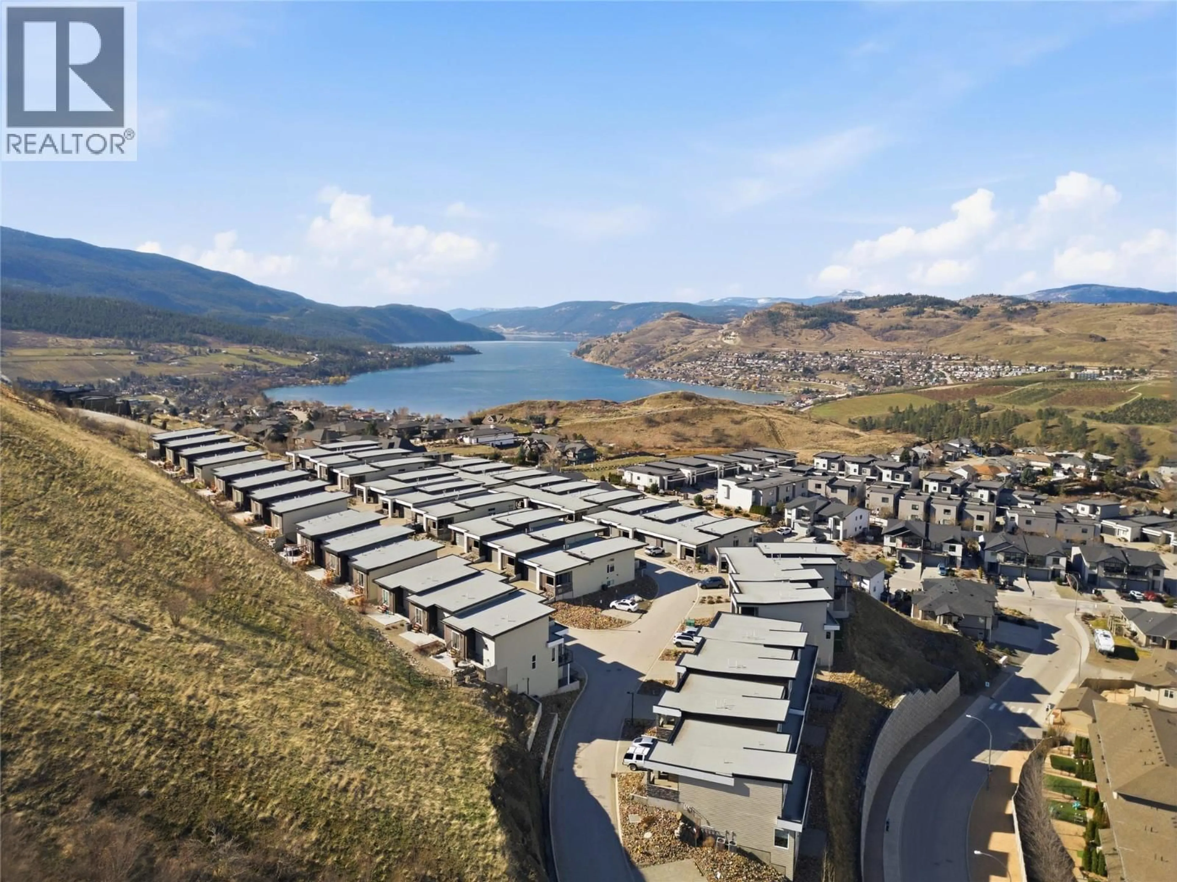A pic from outside/outdoor area/front of a property/back of a property/a pic from drone, water/lake/river/ocean view for 29 - 1000 MT ROBSON PLACE, Vernon British Columbia V1B4G2