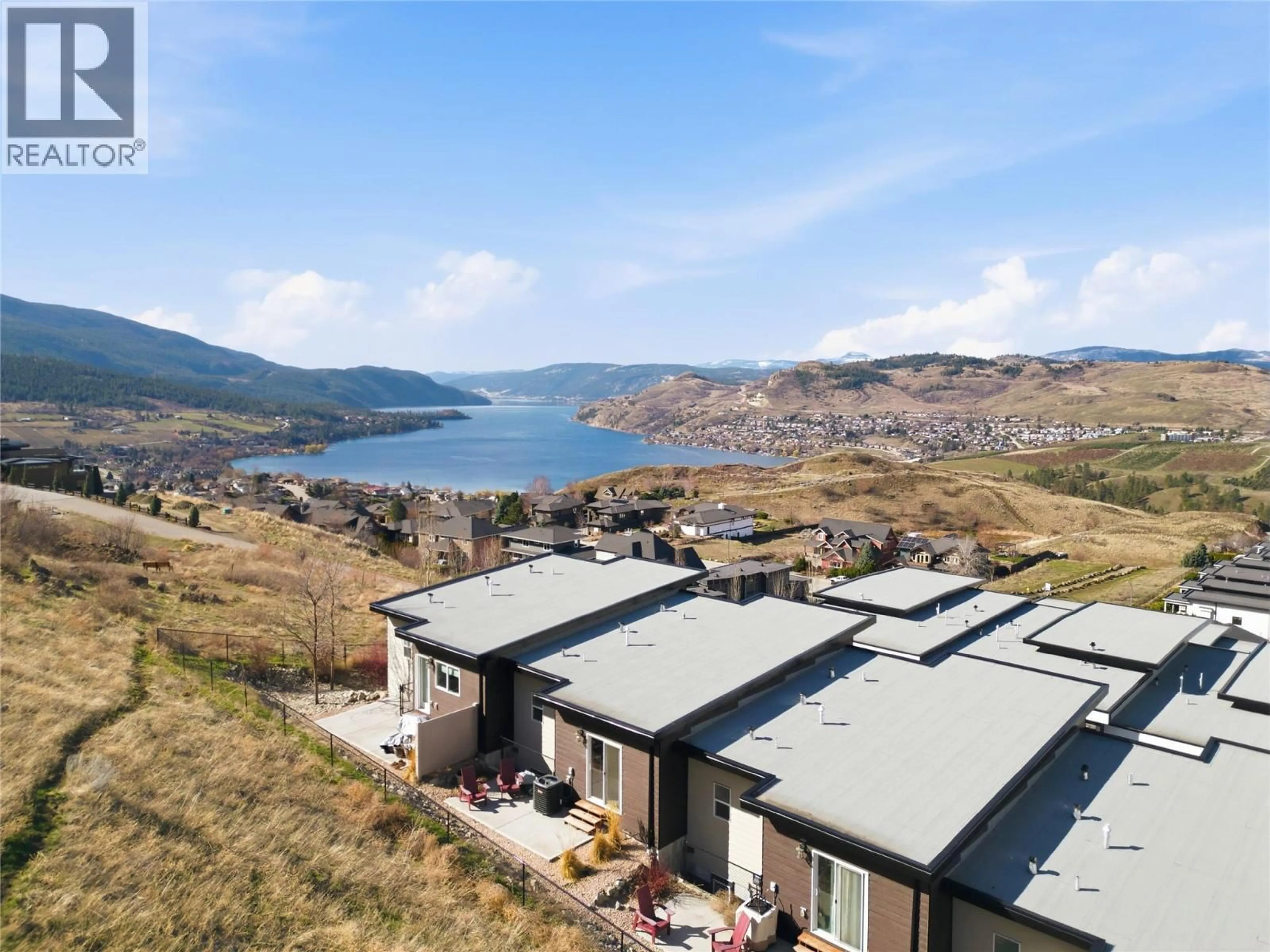 A pic from outside/outdoor area/front of a property/back of a property/a pic from drone, water/lake/river/ocean view for 29 - 1000 MT ROBSON PLACE, Vernon British Columbia V1B4G2