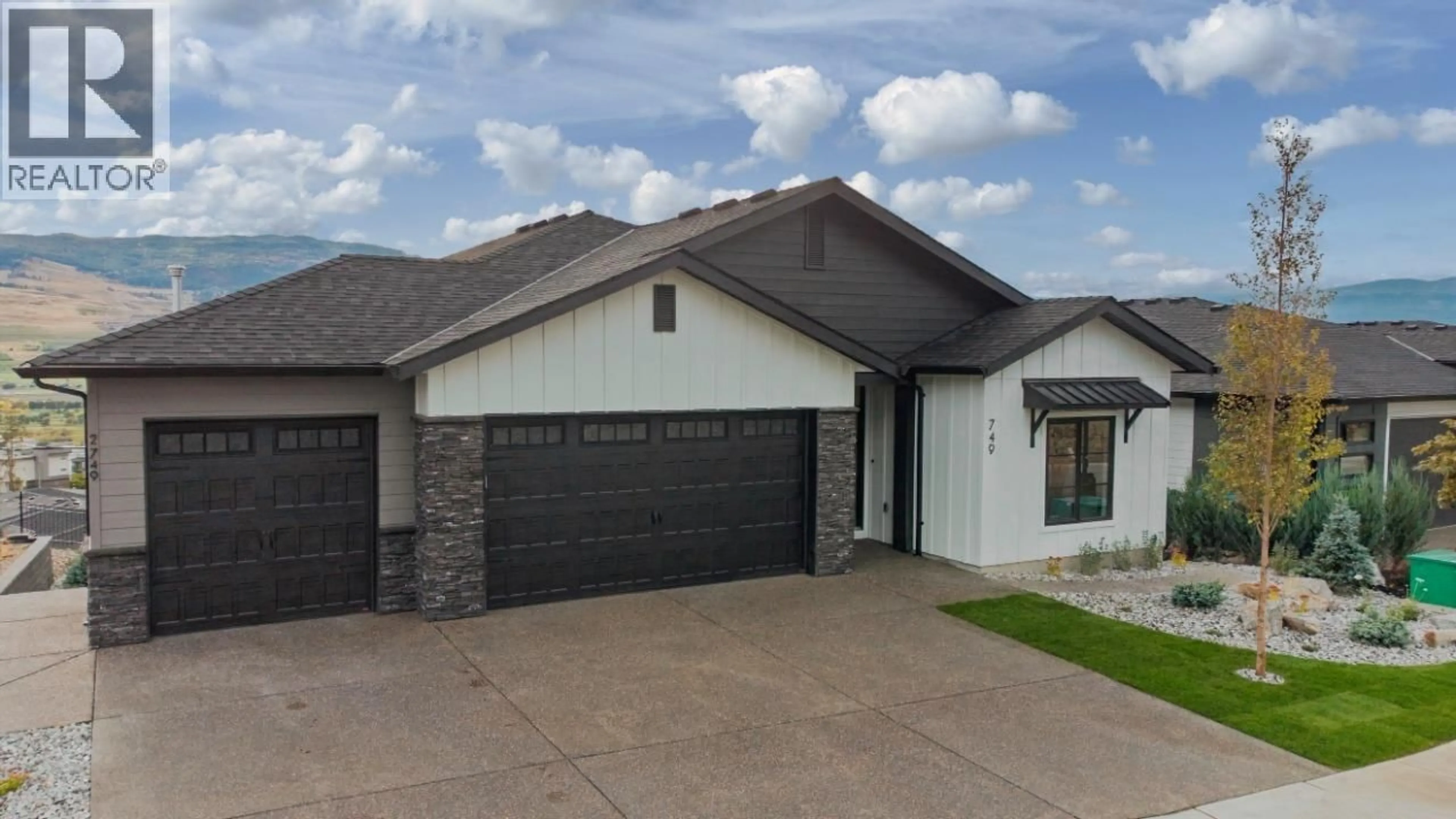 Home with brick exterior material, street for 749 CARLETON STREET, Kelowna British Columbia V1V0A8