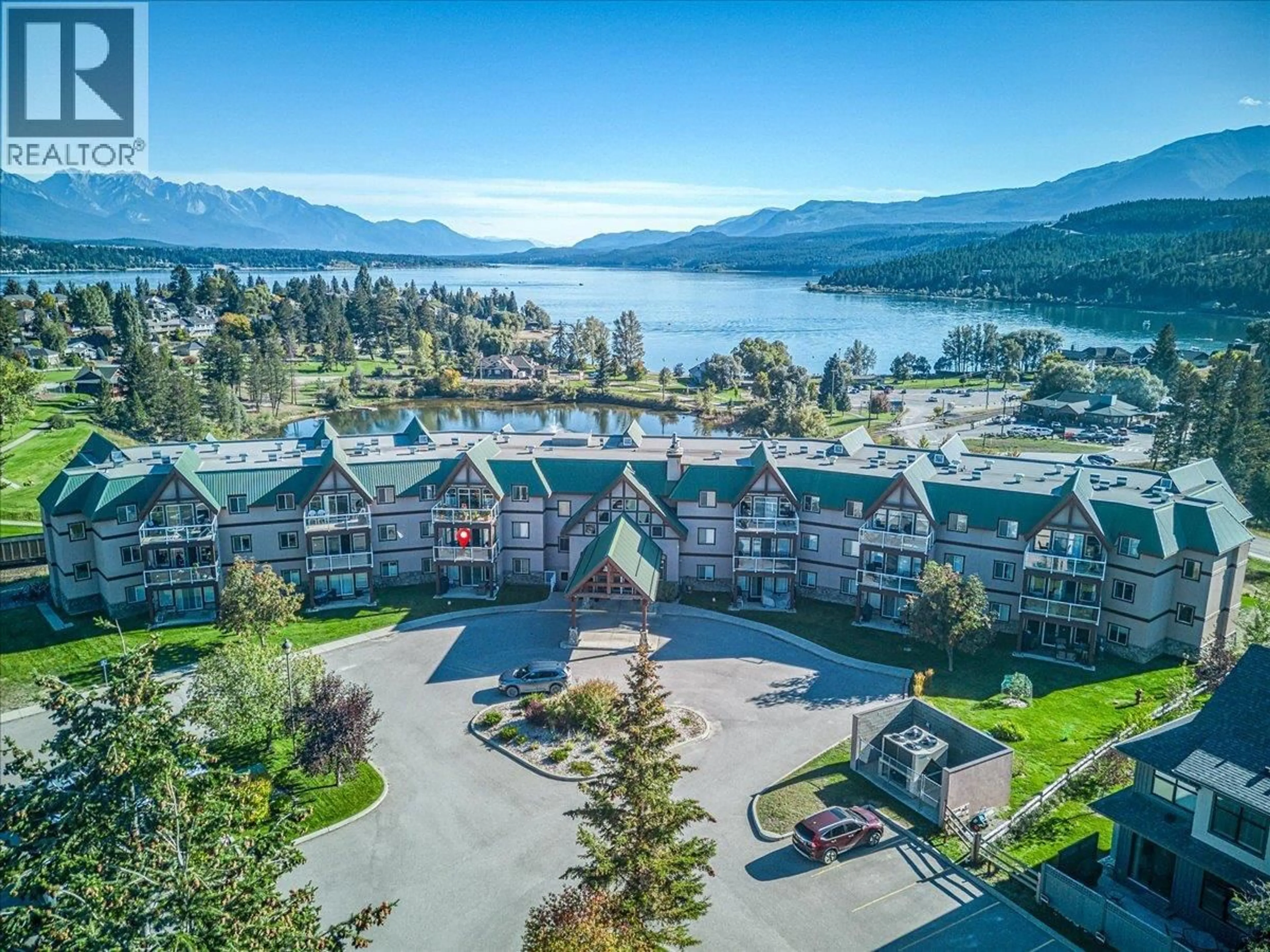 A pic from outside/outdoor area/front of a property/back of a property/a pic from drone, water/lake/river/ocean view for 214 - 701 14A CRESCENT, Invermere British Columbia V0A1K0