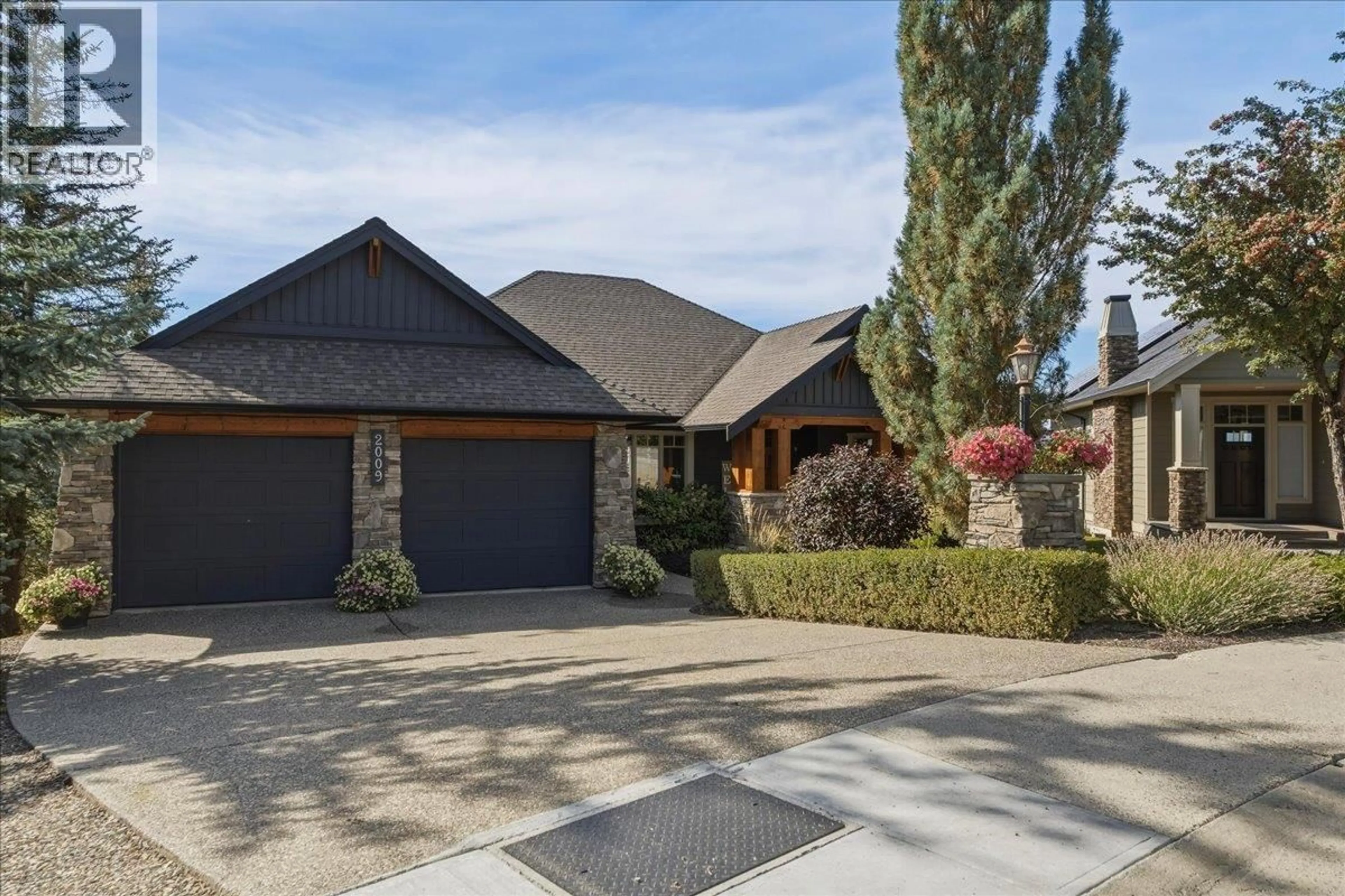 Home with brick exterior material, street for 2009 APEX COURT, Vernon British Columbia V1B3Z4