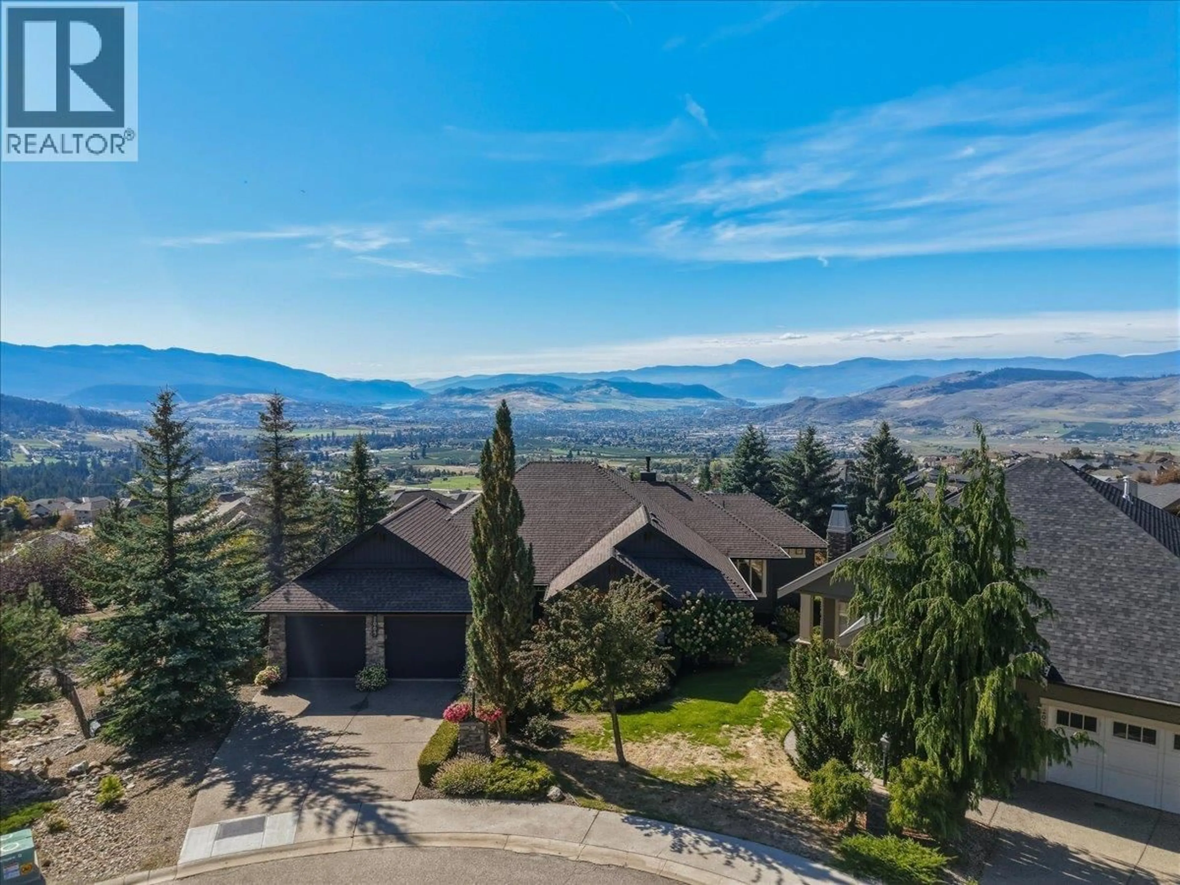 A pic from outside/outdoor area/front of a property/back of a property/a pic from drone, mountain view for 2009 APEX COURT, Vernon British Columbia V1B3Z4