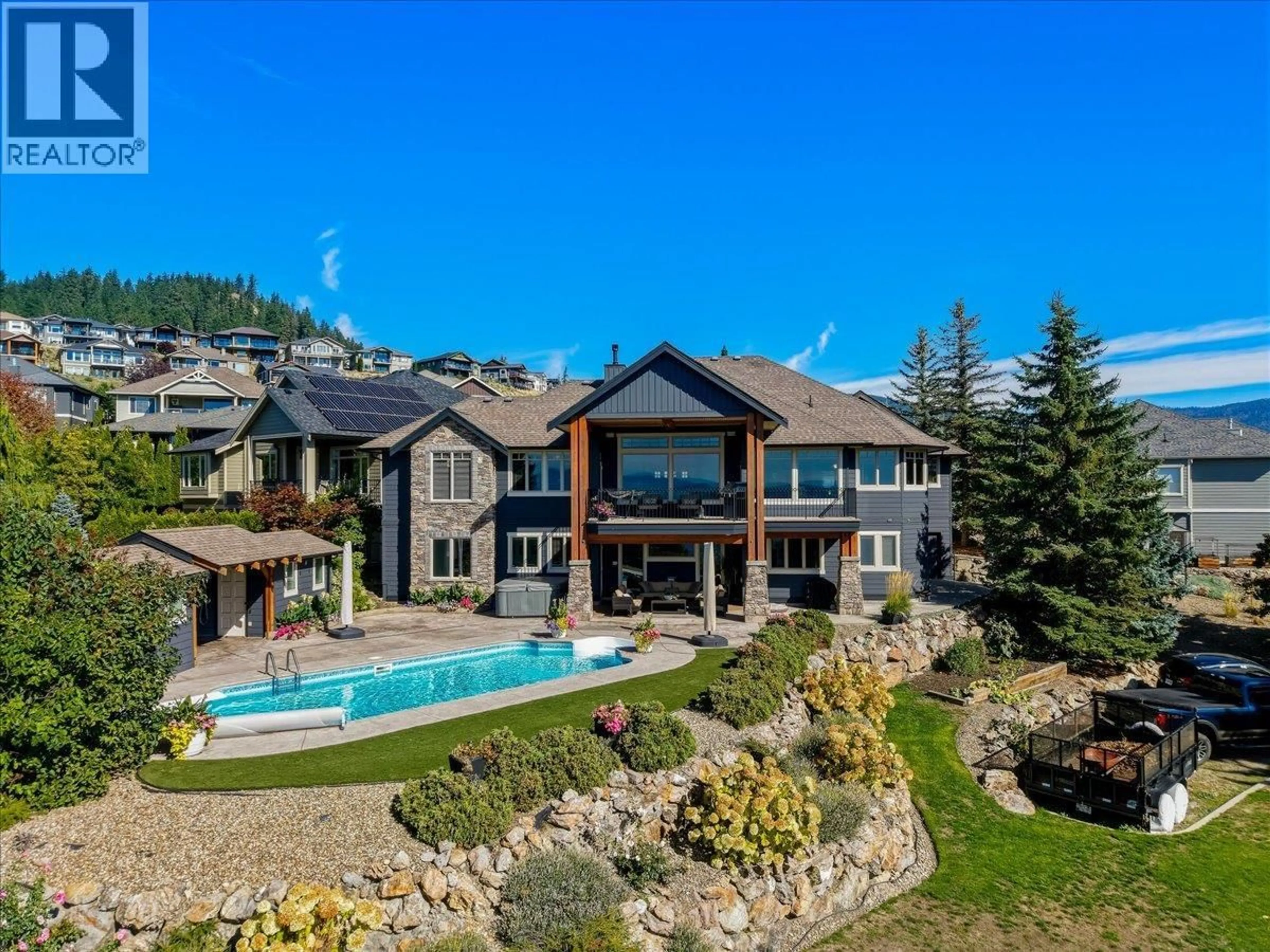 A pic from outside/outdoor area/front of a property/back of a property/a pic from drone, mountain view for 2009 APEX COURT, Vernon British Columbia V1B3Z4