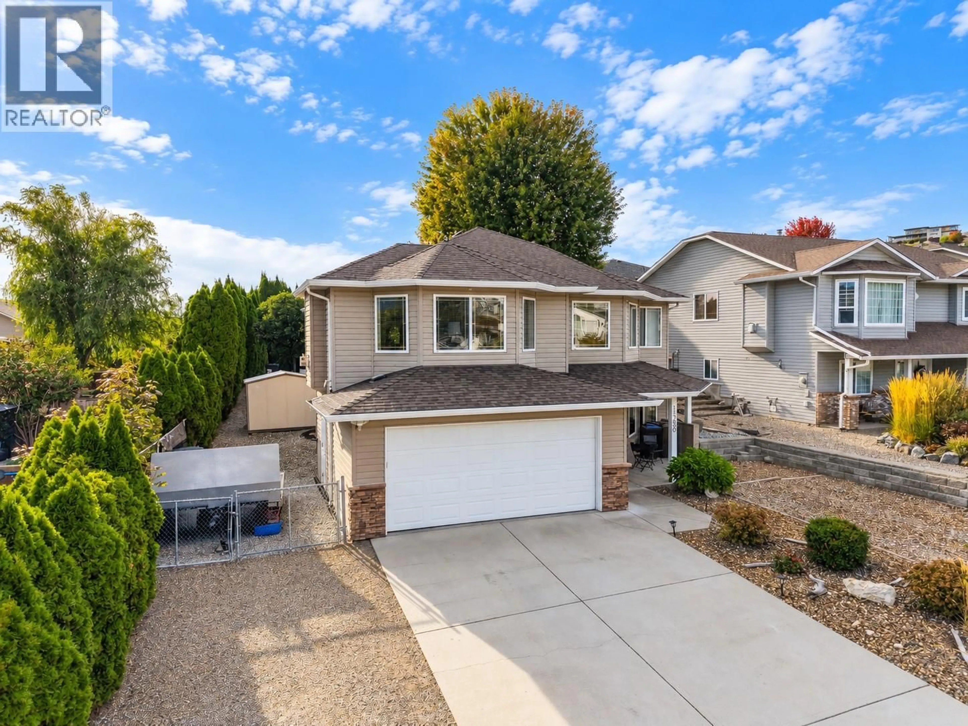 A pic from outside/outdoor area/front of a property/back of a property/a pic from drone, street for 1380 LOSETH DRIVE, Kelowna British Columbia V1P1M8