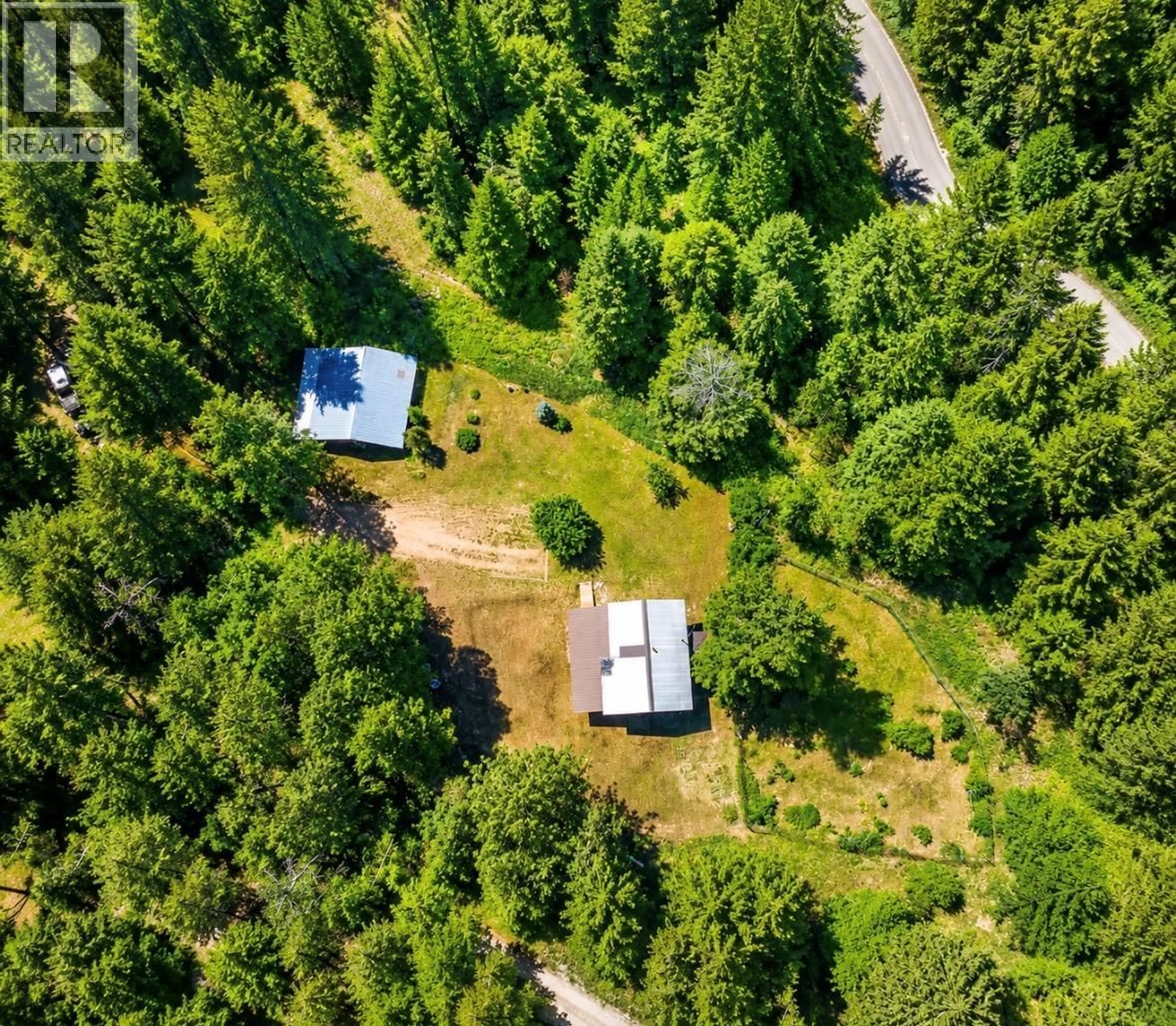 A pic from outside/outdoor area/front of a property/back of a property/a pic from drone, forest/trees view for 10555 GRANBY ROAD, Grand Forks British Columbia V0H1H1