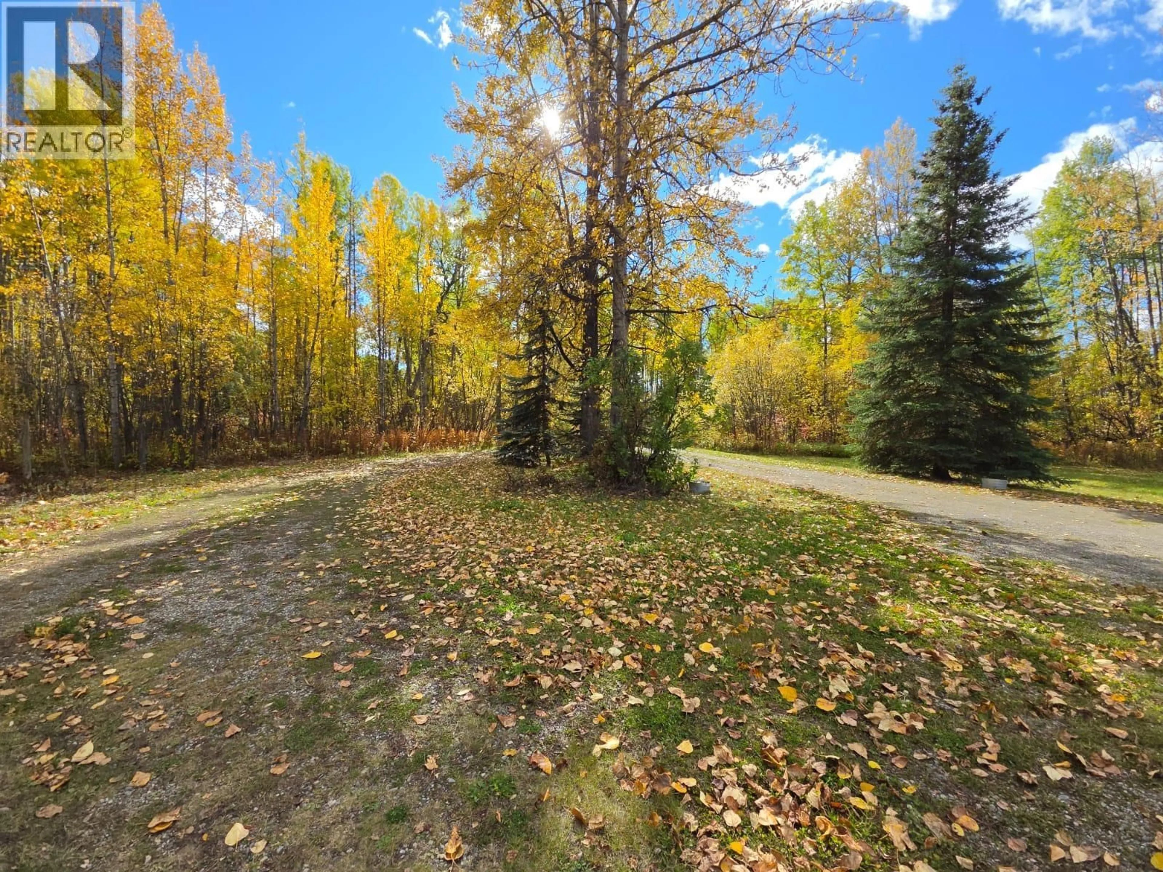 A pic from outside/outdoor area/front of a property/back of a property/a pic from drone, forest/trees view for 6082 CENTENNIAL ROAD WEST, Moberly Lake British Columbia V0C1X0