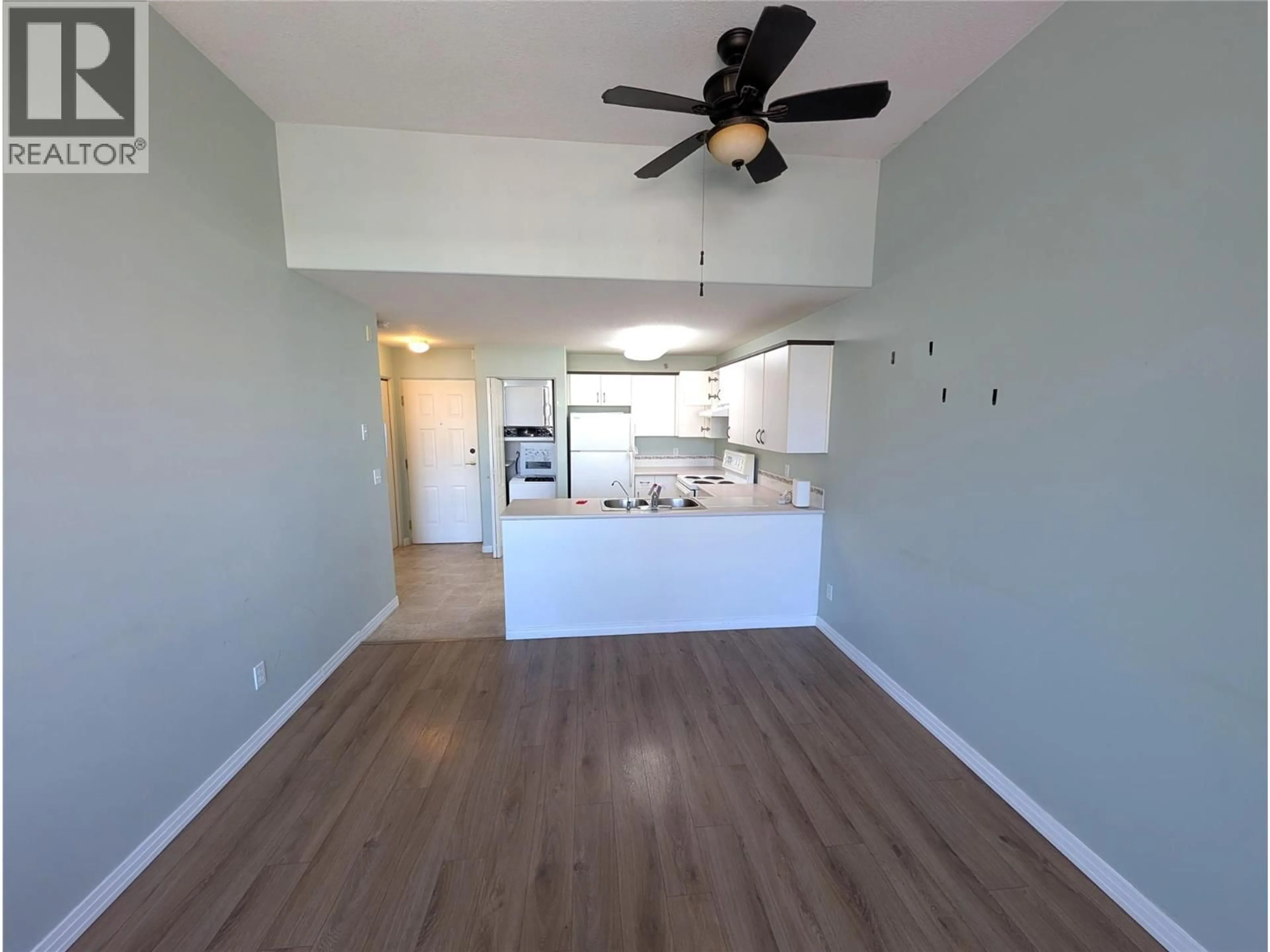 Open concept kitchen, wood/laminate floor for 411 - 554 SEYMOUR STREET, Kamloops British Columbia V2C2G9