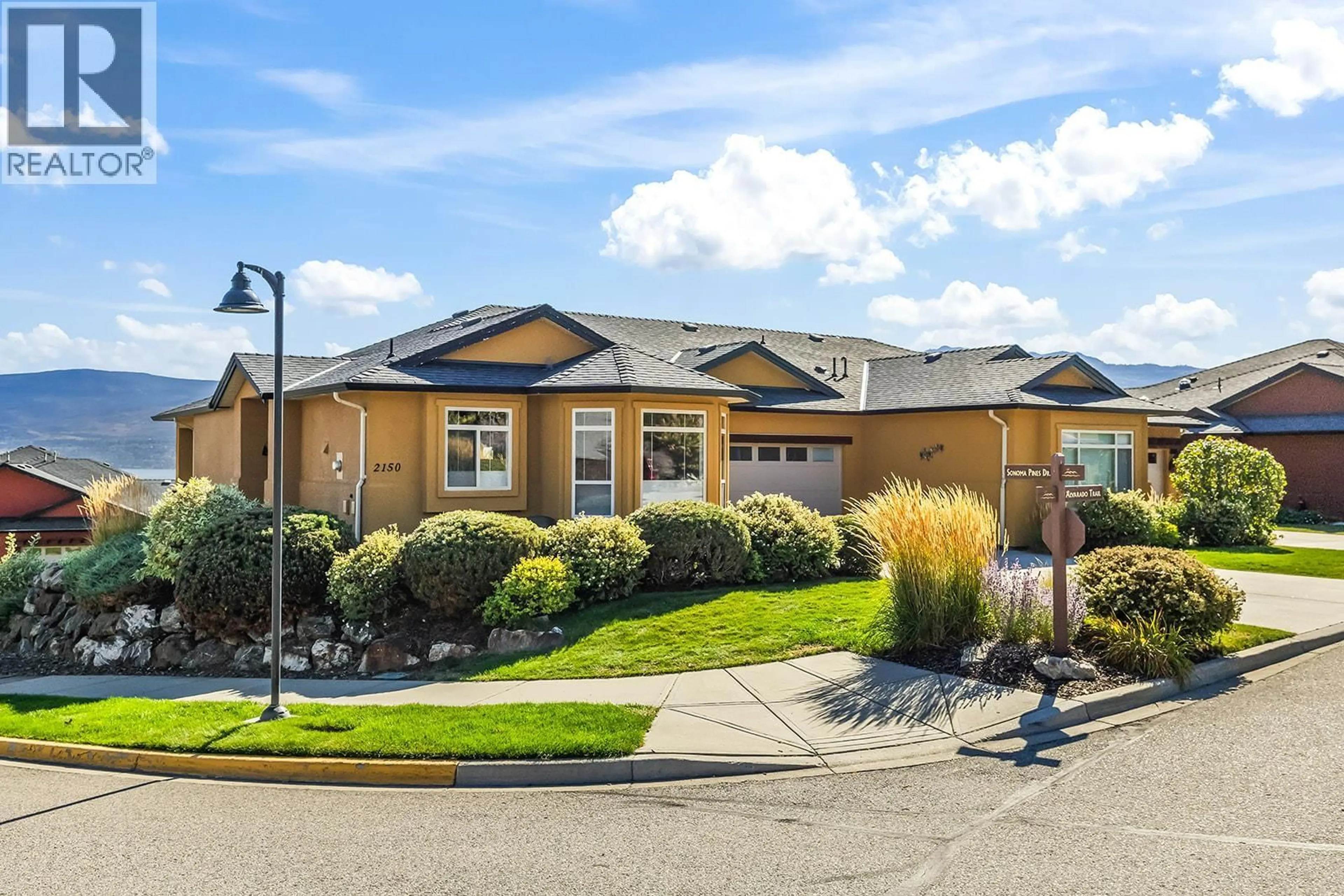Home with vinyl exterior material, street for 2150 ALVARADO TRAIL, Westbank British Columbia V4T3B8