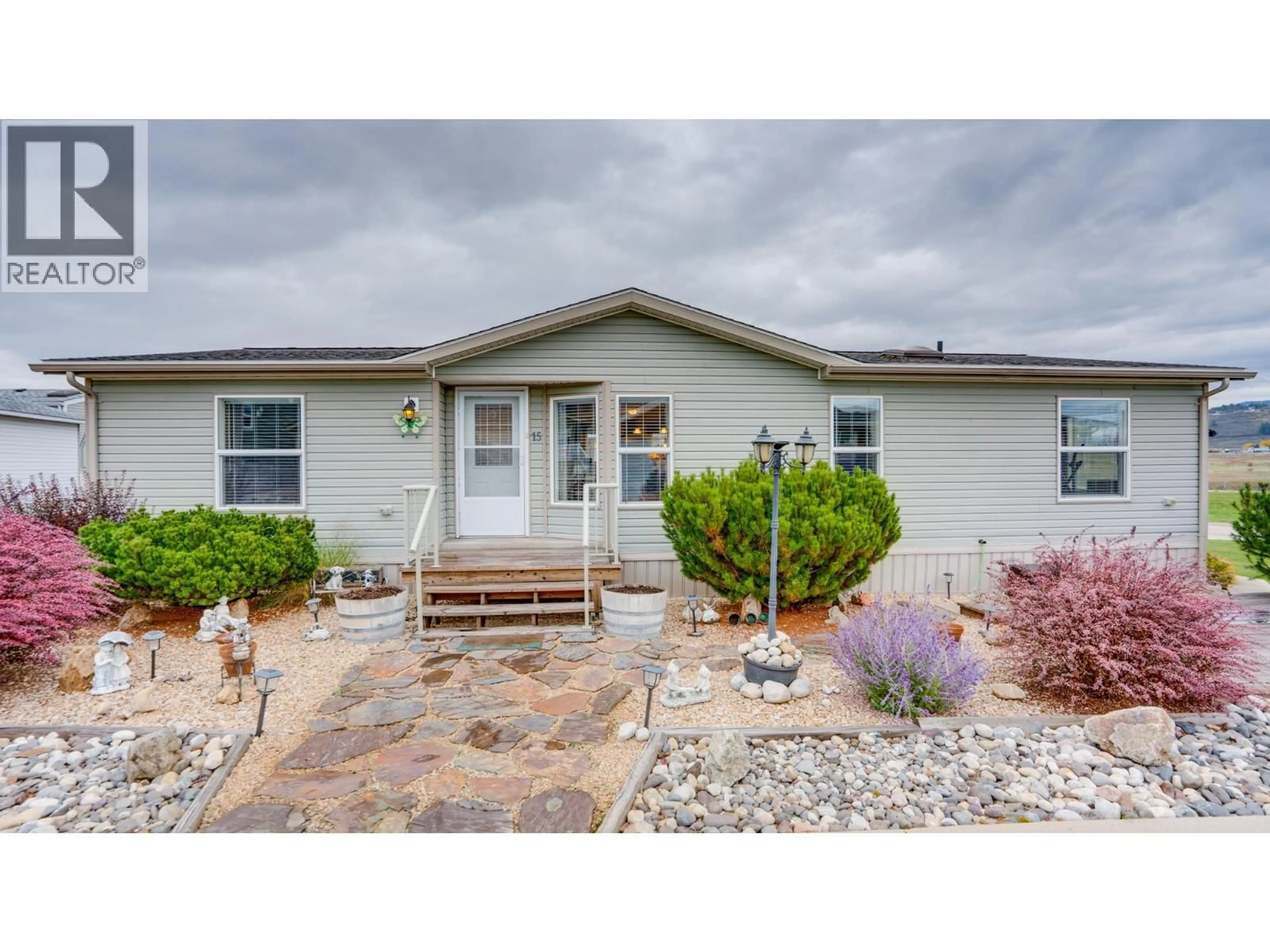 Home with vinyl exterior material, street for 15 - 12560 WESTSIDE ROAD, Vernon British Columbia V1H1S9