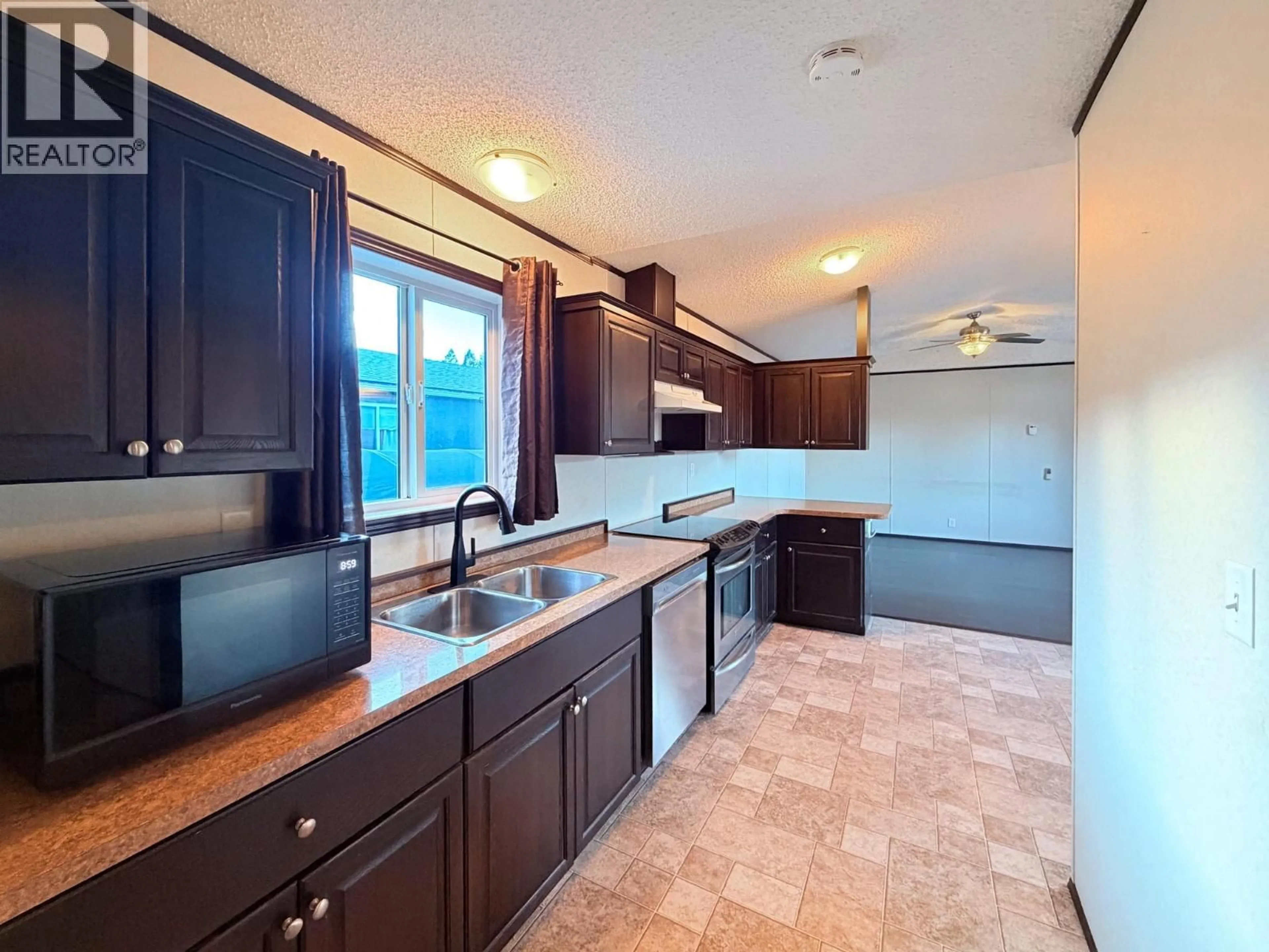 Open concept kitchen, ceramic/tile floor for 4821 CRESCENTWOOD DRIVE, Edgewater British Columbia V0A1E0