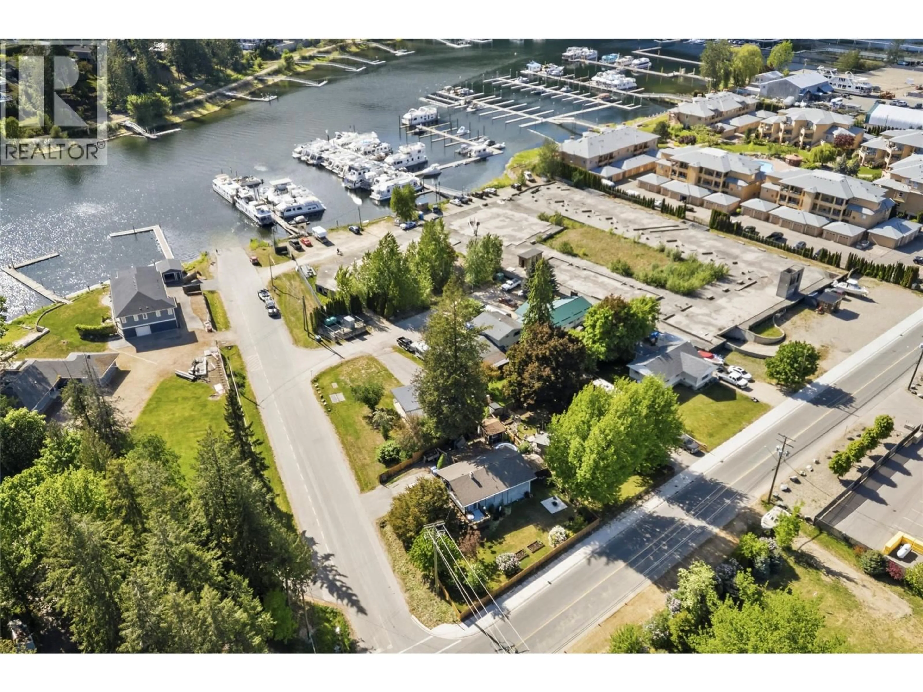 A pic from outside/outdoor area/front of a property/back of a property/a pic from drone, water/lake/river/ocean view for 606 RIVERSIDE AVENUE, Sicamous British Columbia V0E2V0