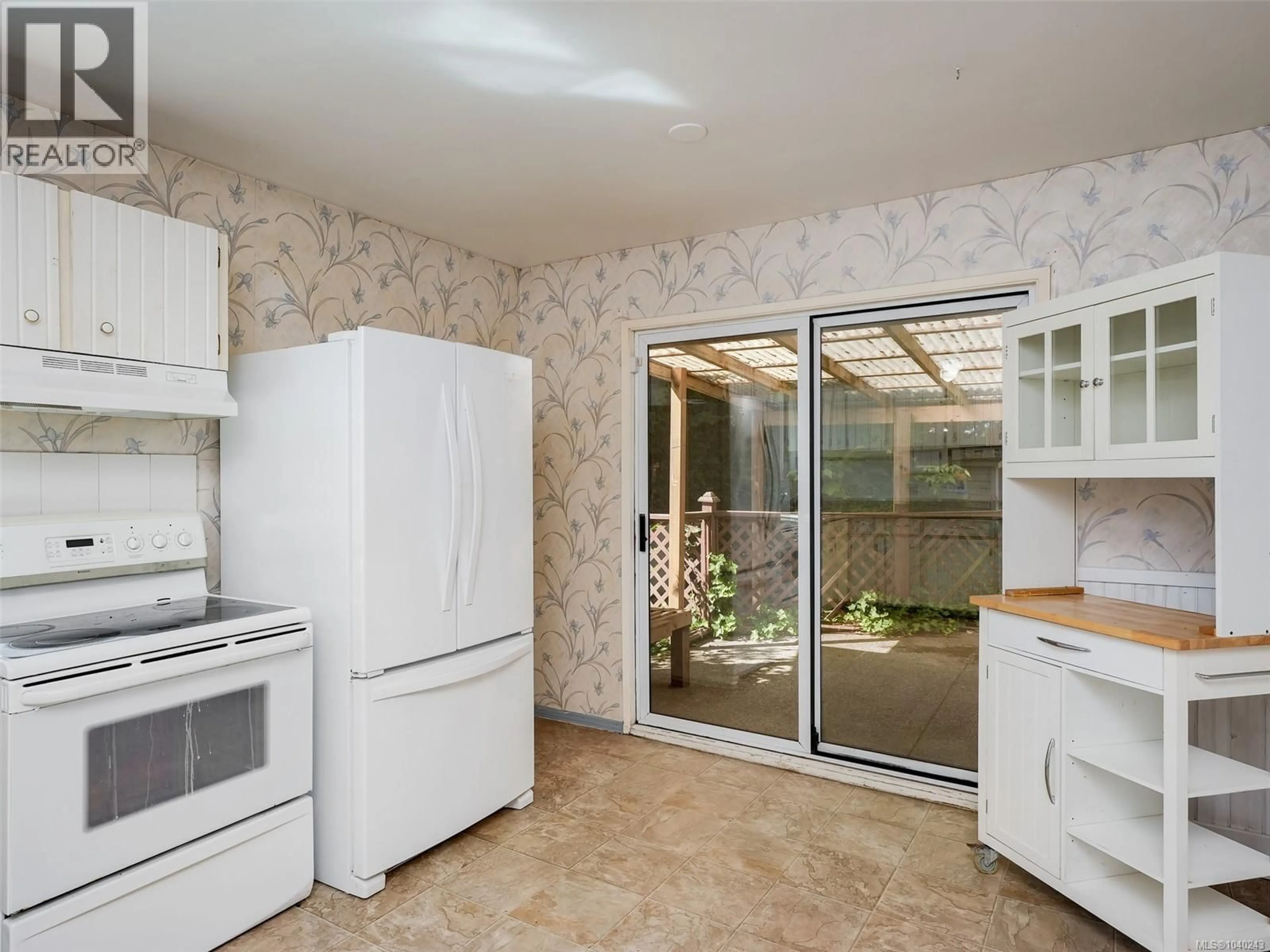Standard kitchen, ceramic/tile floor for 10040 WISTERIA PLACE, Sidney British Columbia V8L4E7