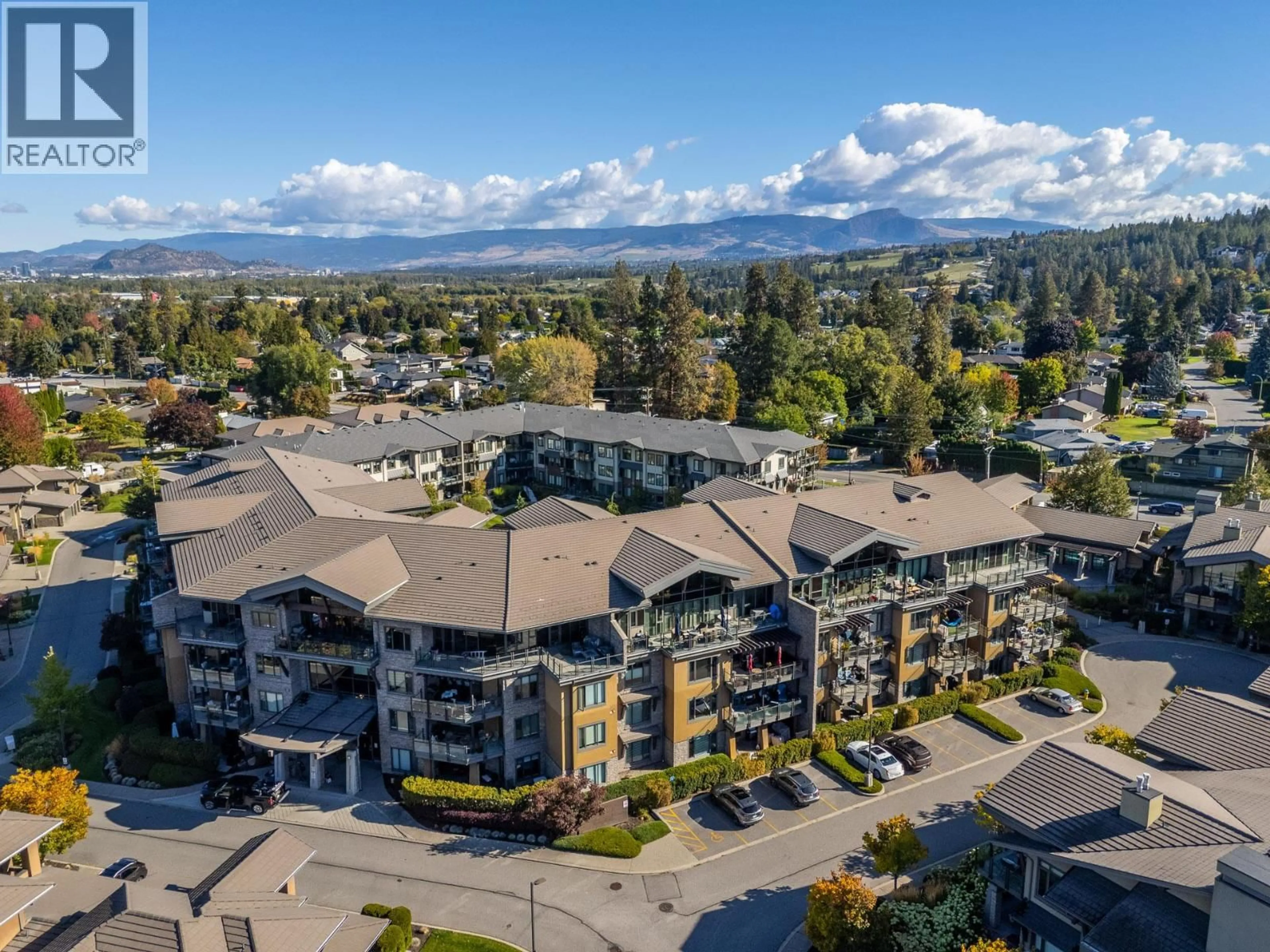 A pic from outside/outdoor area/front of a property/back of a property/a pic from drone, mountain view for 115 - 580 SARSONS ROAD, Kelowna British Columbia V1W5H5