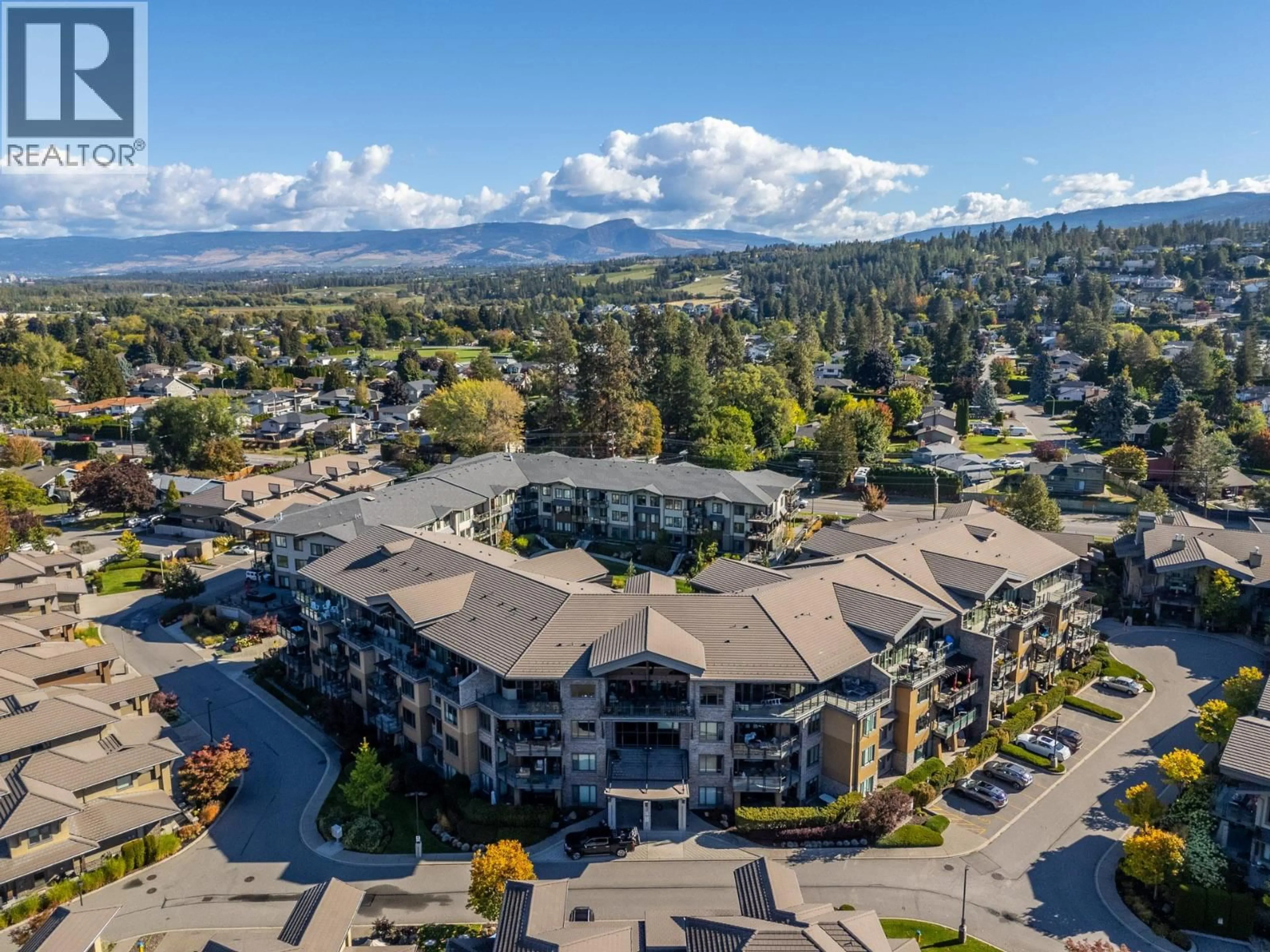 A pic from outside/outdoor area/front of a property/back of a property/a pic from drone, mountain view for 115 - 580 SARSONS ROAD, Kelowna British Columbia V1W5H5
