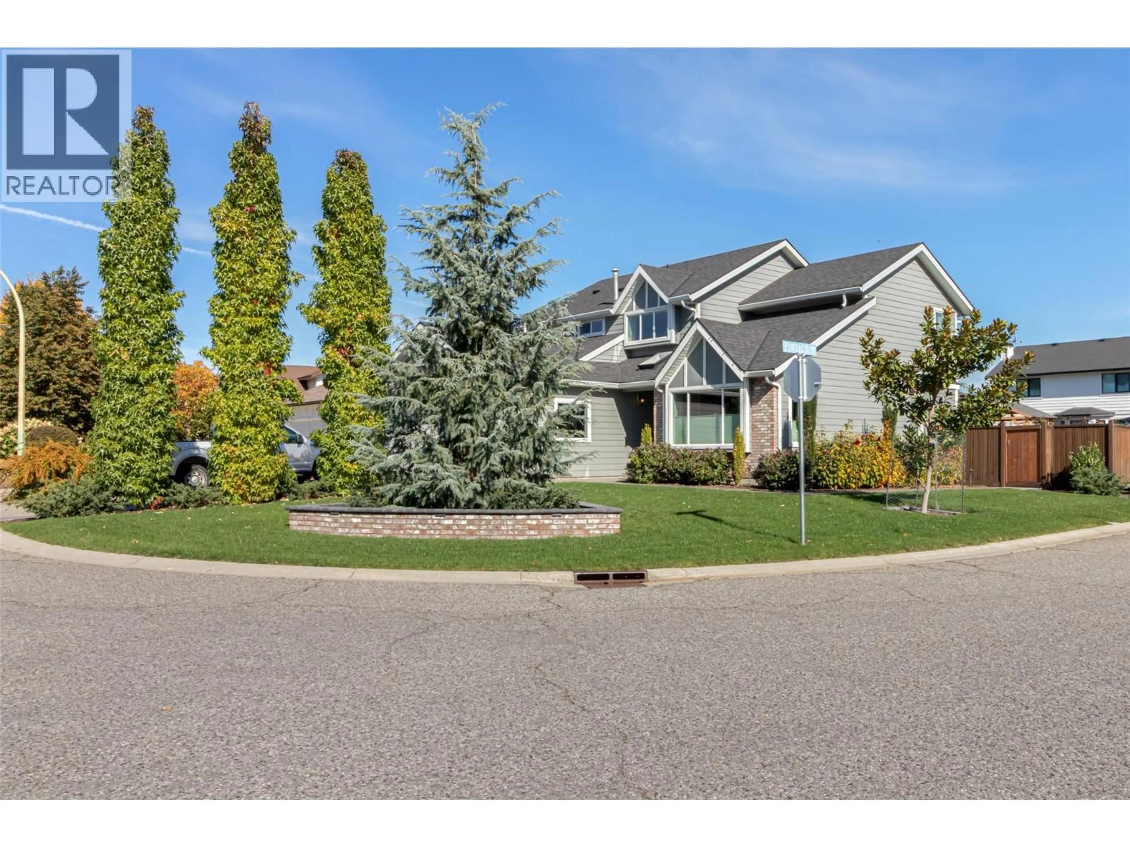Home with vinyl exterior material, street for 4029 BELMONT ROAD, Kelowna British Columbia V1W2Z2