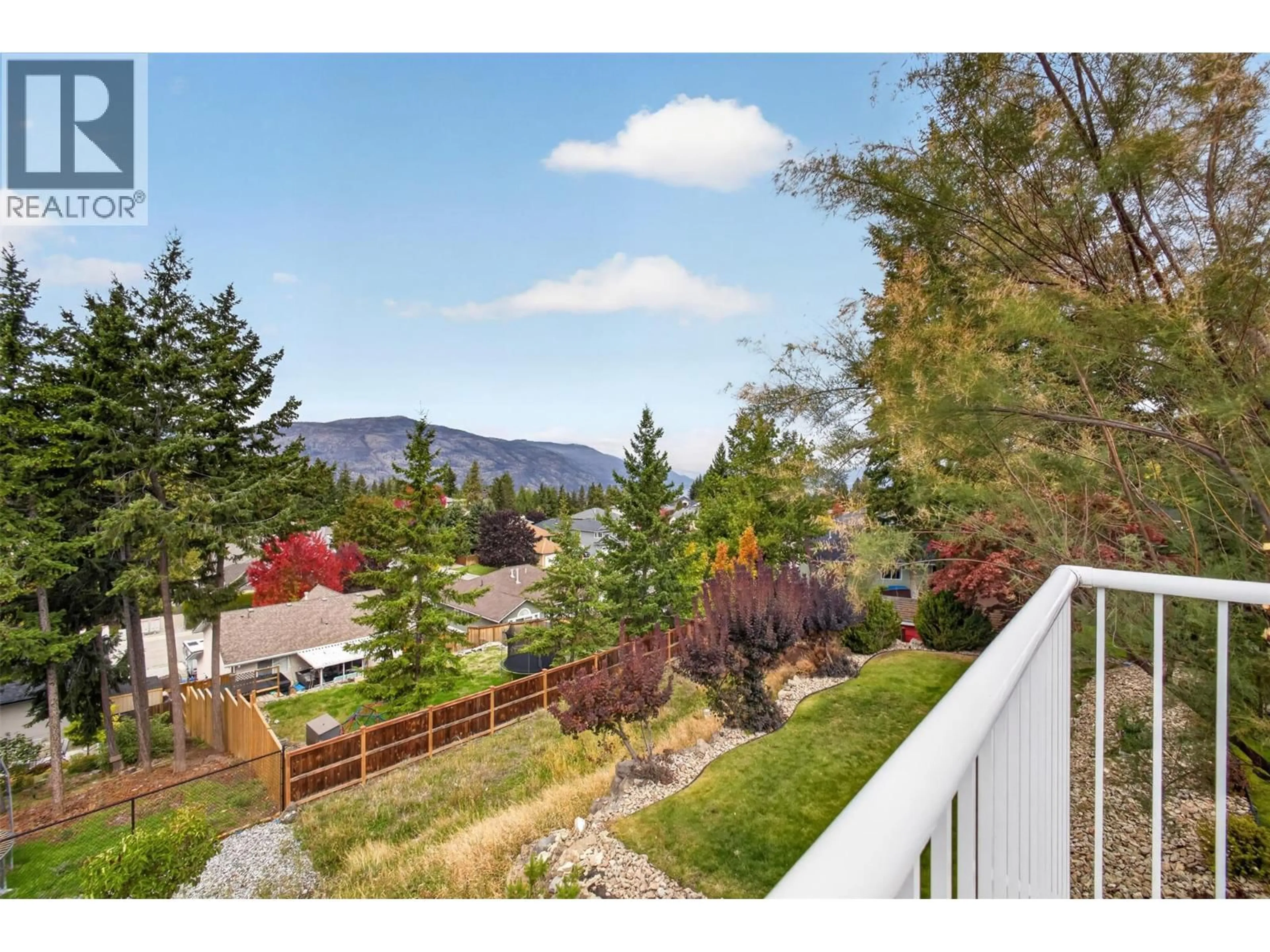 A pic from outside/outdoor area/front of a property/back of a property/a pic from drone, mountain view for 330 WOODWIND COURT, Kelowna British Columbia V1V2L3