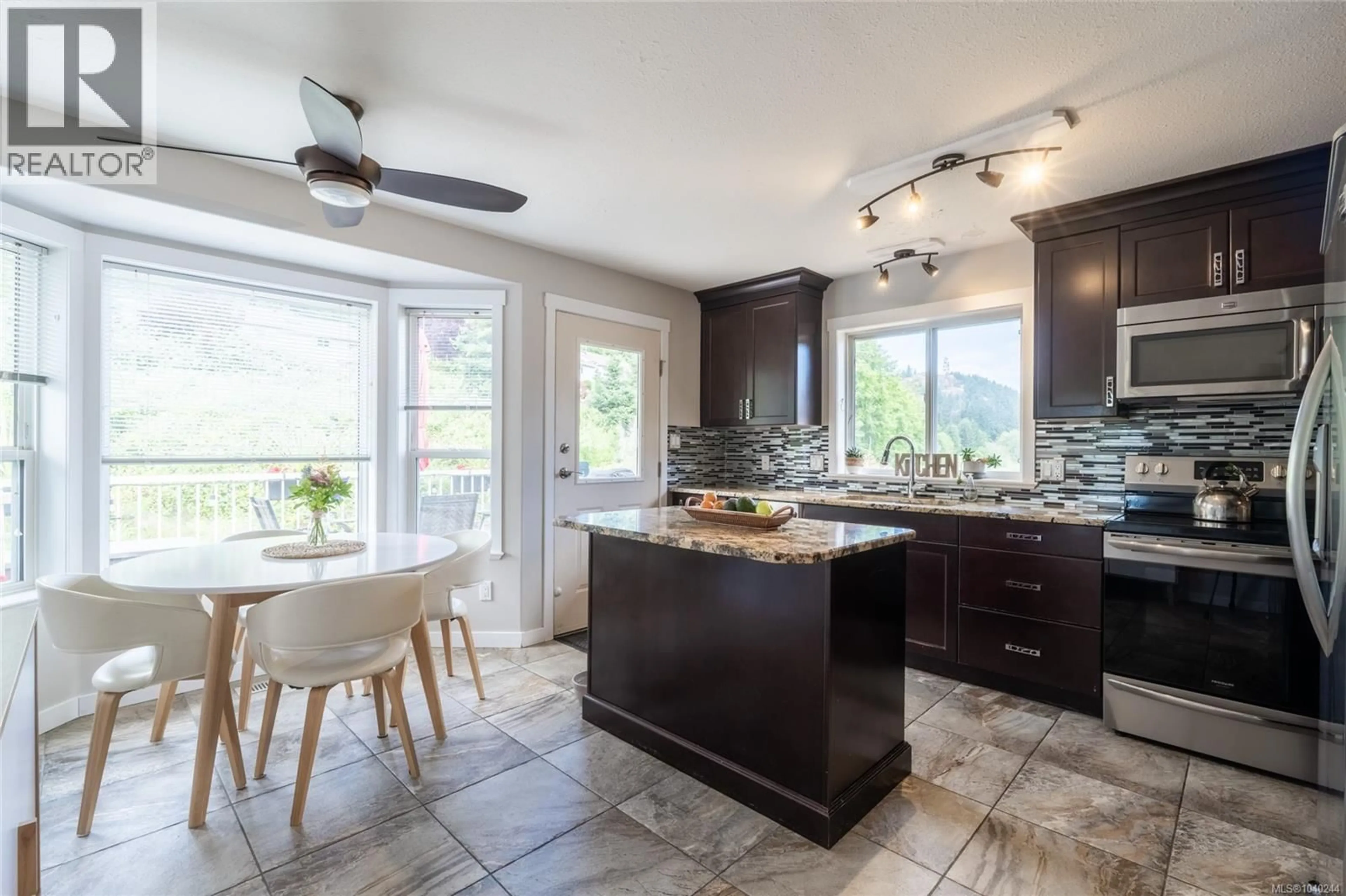 Contemporary kitchen, ceramic/tile floor for 5039 BULLRUSH PLACE, Nanaimo British Columbia V9T6K7