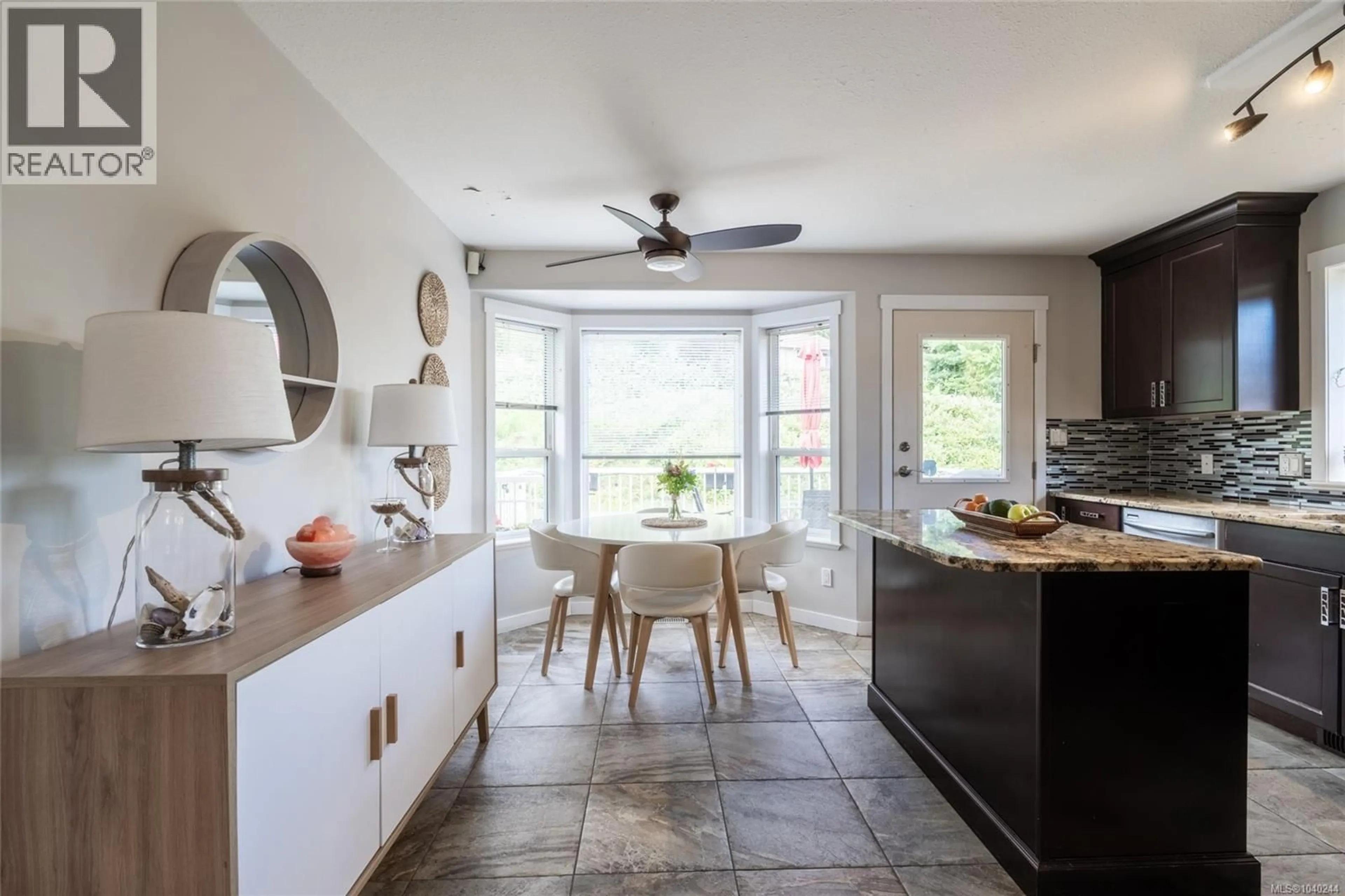Open concept kitchen, ceramic/tile floor for 5039 BULLRUSH PLACE, Nanaimo British Columbia V9T6K7