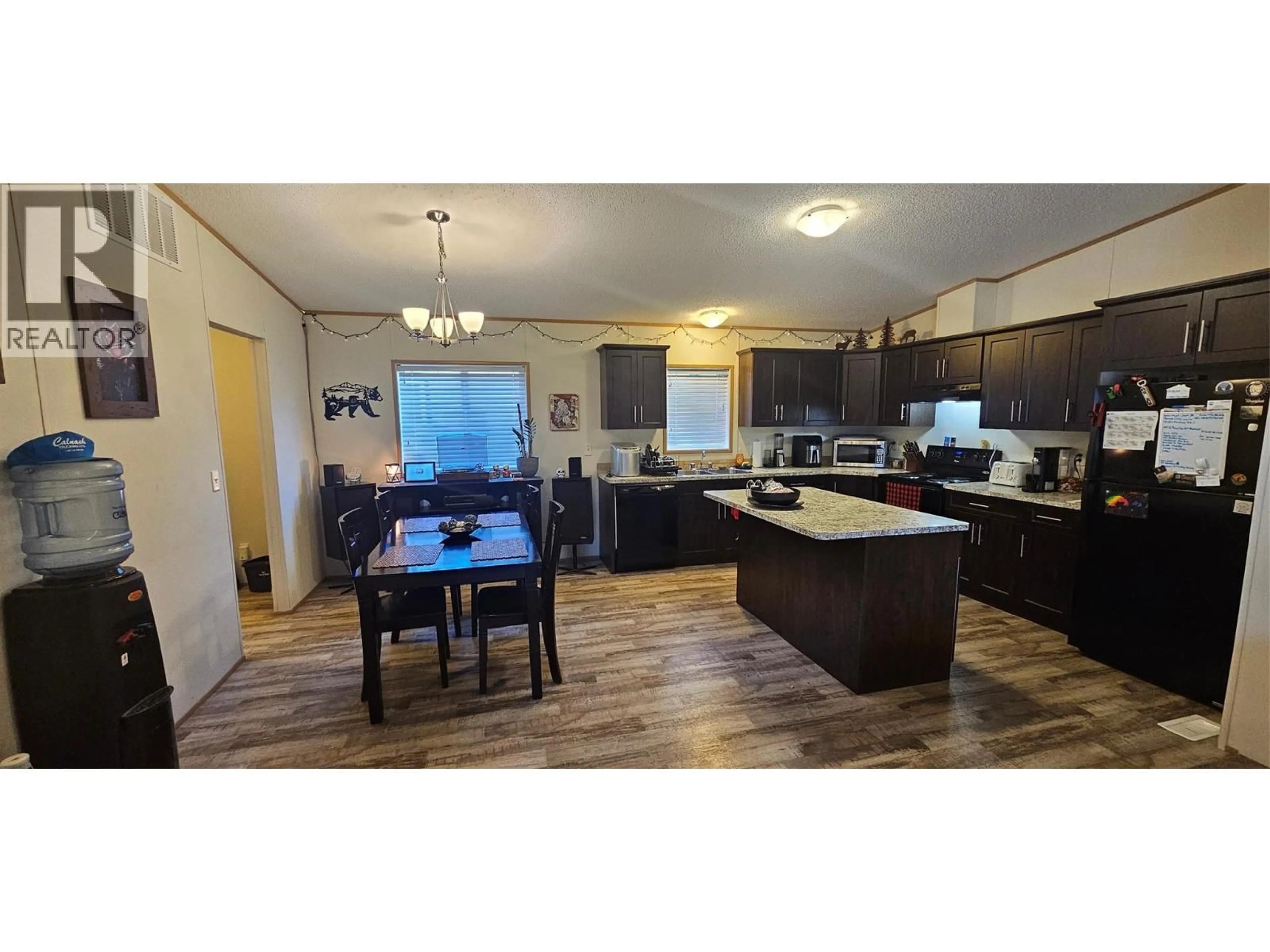 Open concept kitchen, wood/laminate floor for 48 WILDERNESS HEIGHTS DRIVE, Elkford British Columbia V0B1H0
