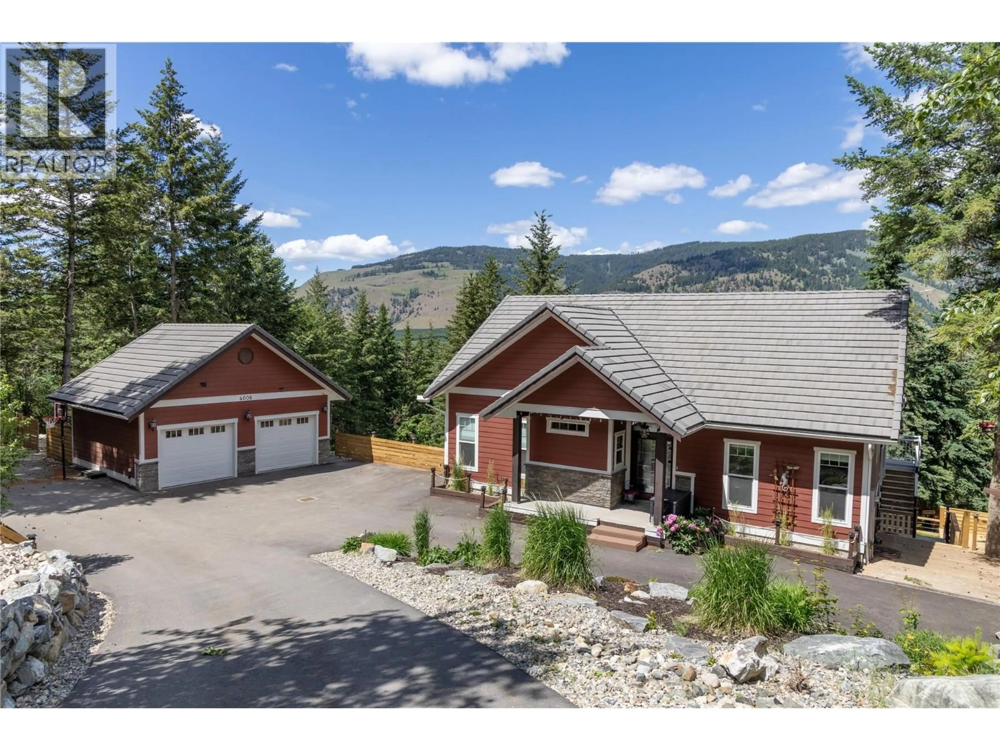 A pic from outside/outdoor area/front of a property/back of a property/a pic from drone, mountain view for 4006 COACHWOOD CLOSE, Coldstream British Columbia V1B3Y4