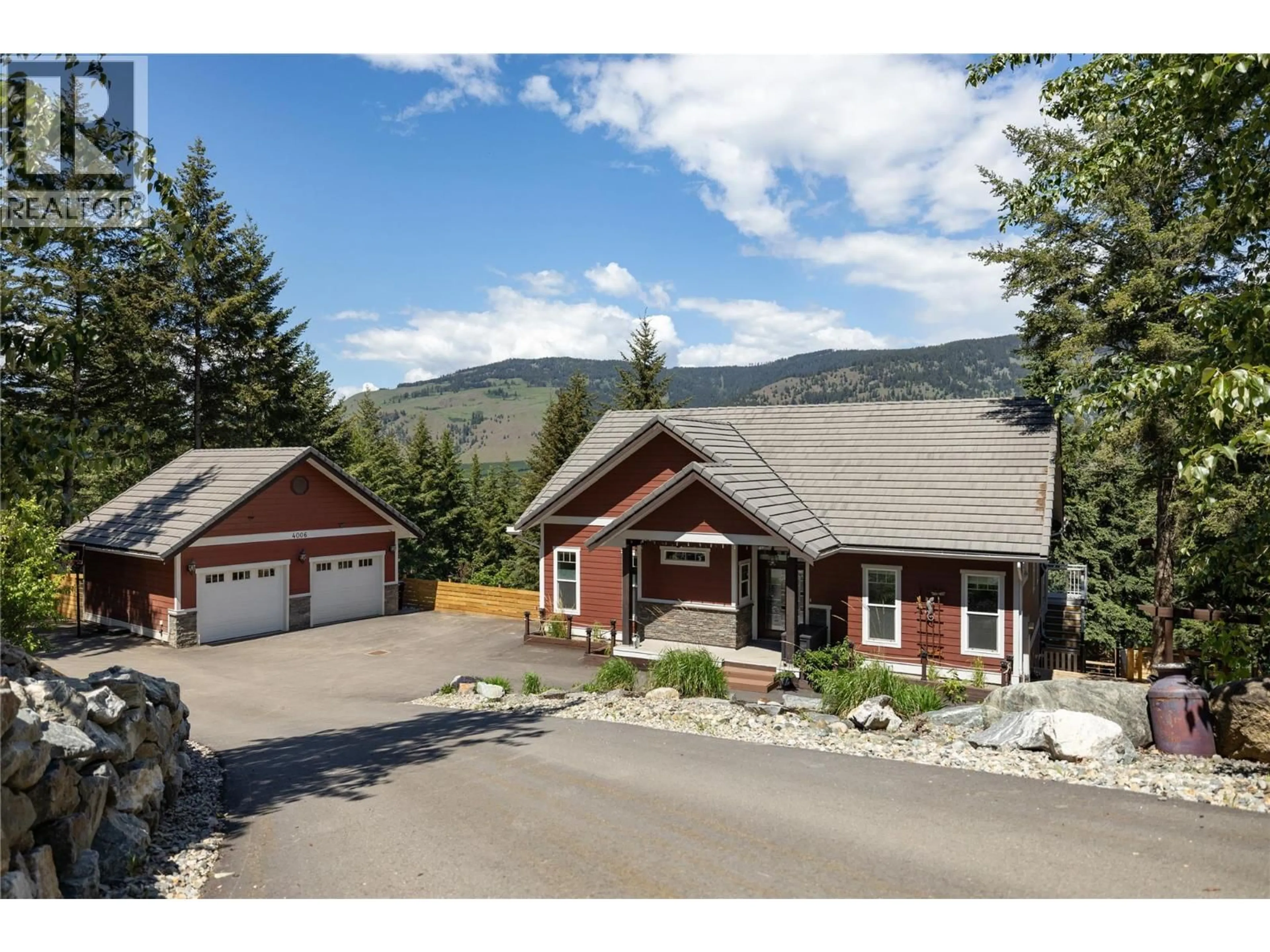 A pic from outside/outdoor area/front of a property/back of a property/a pic from drone, mountain view for 4006 COACHWOOD CLOSE, Coldstream British Columbia V1B3Y4