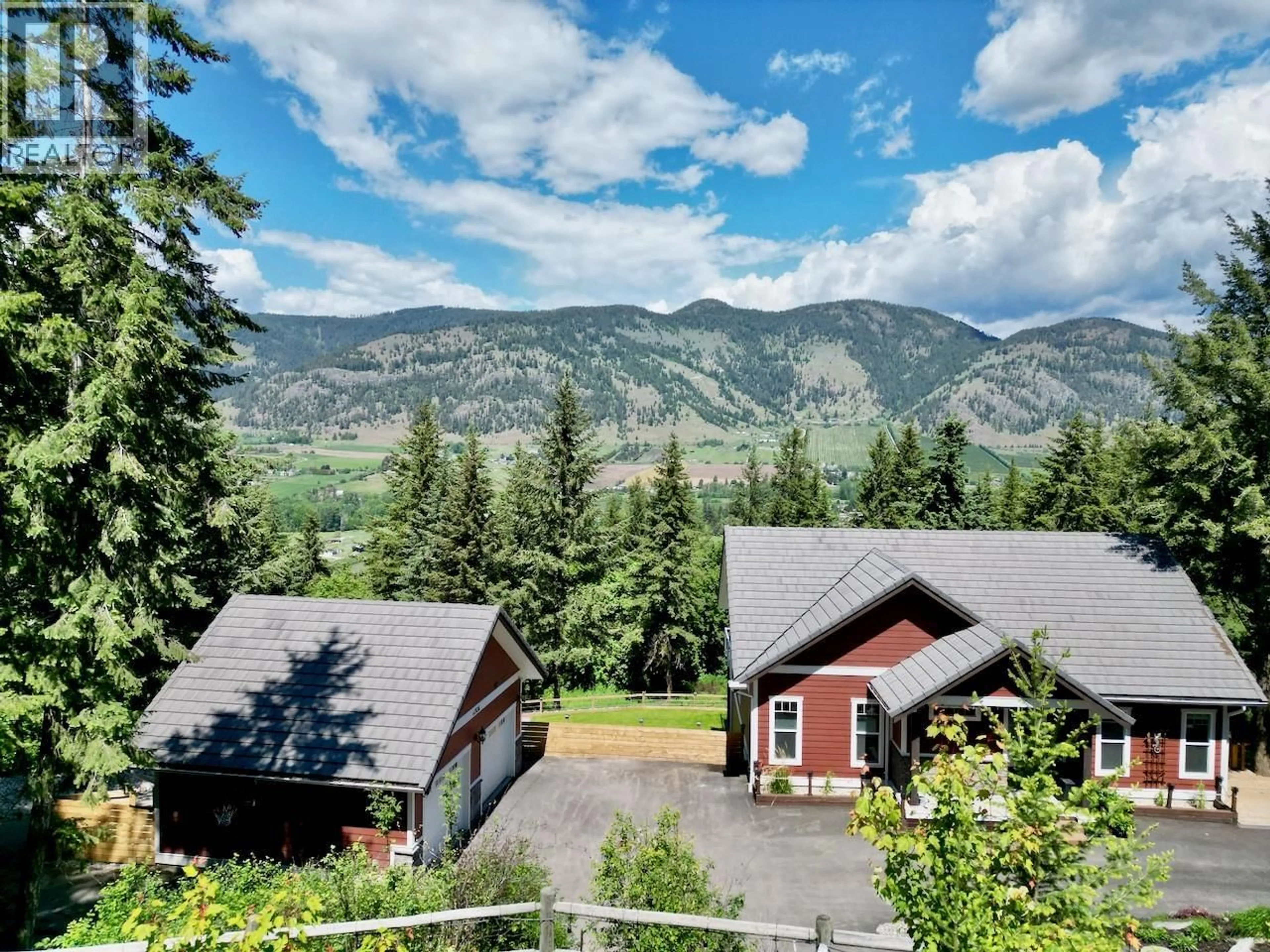 A pic from outside/outdoor area/front of a property/back of a property/a pic from drone, mountain view for 4006 COACHWOOD CLOSE, Coldstream British Columbia V1B3Y4