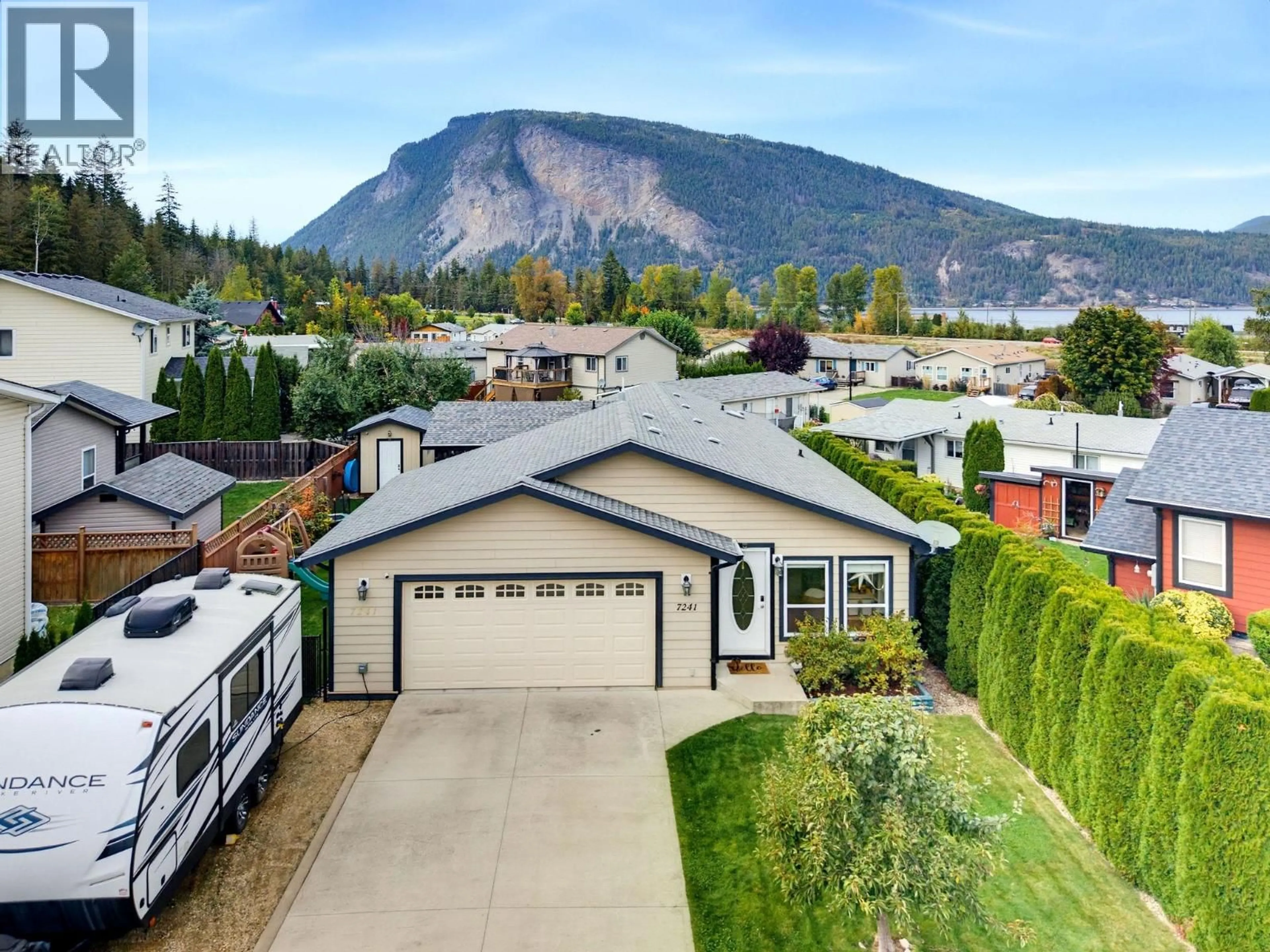 A pic from outside/outdoor area/front of a property/back of a property/a pic from drone, mountain view for 7241 46 STREET NORTHEAST, Salmon Arm British Columbia V0E1K0