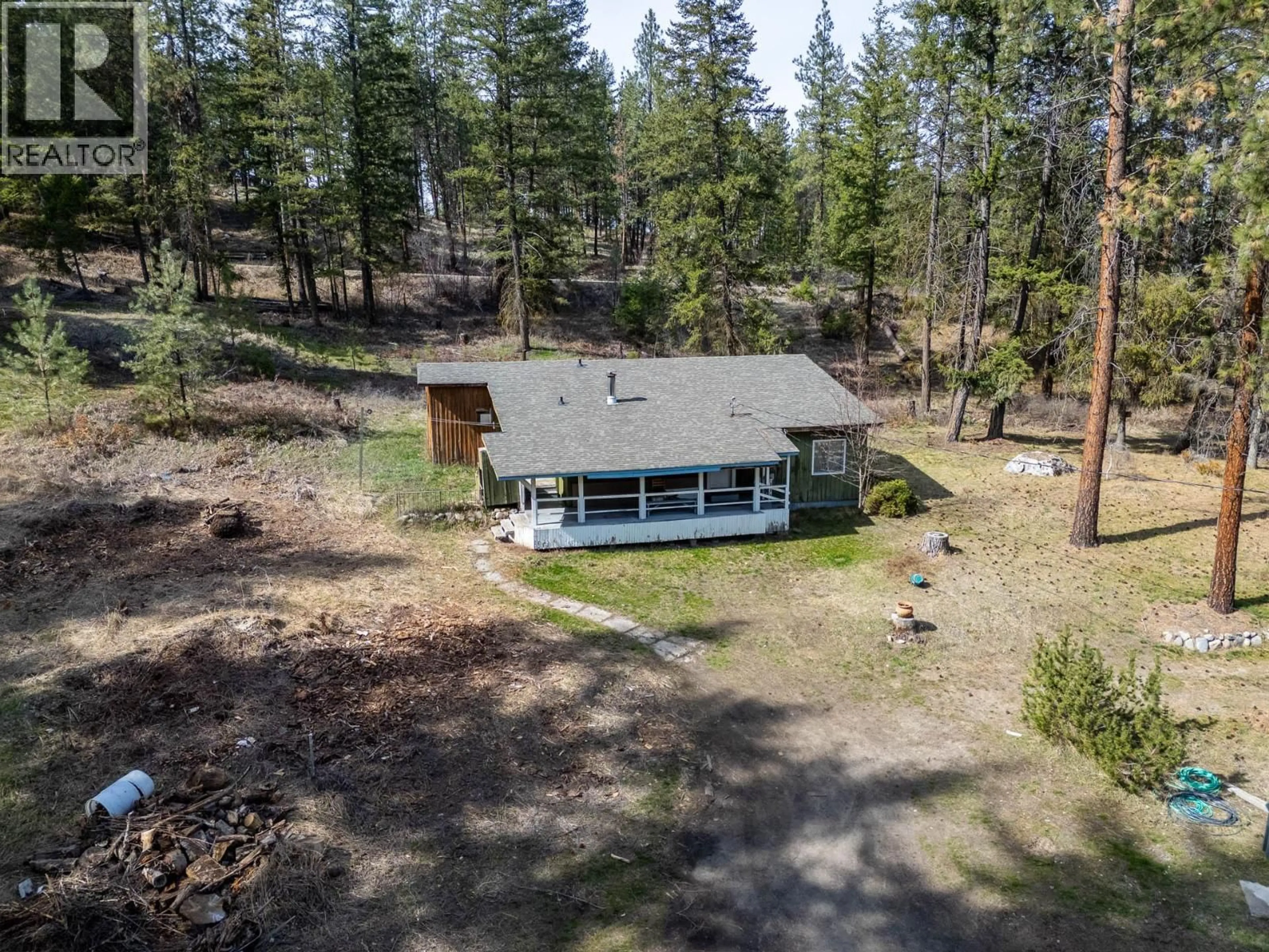 A pic from outside/outdoor area/front of a property/back of a property/a pic from drone, forest/trees view for 3525 MATHEWS ROAD, Kelowna British Columbia V1W4C6