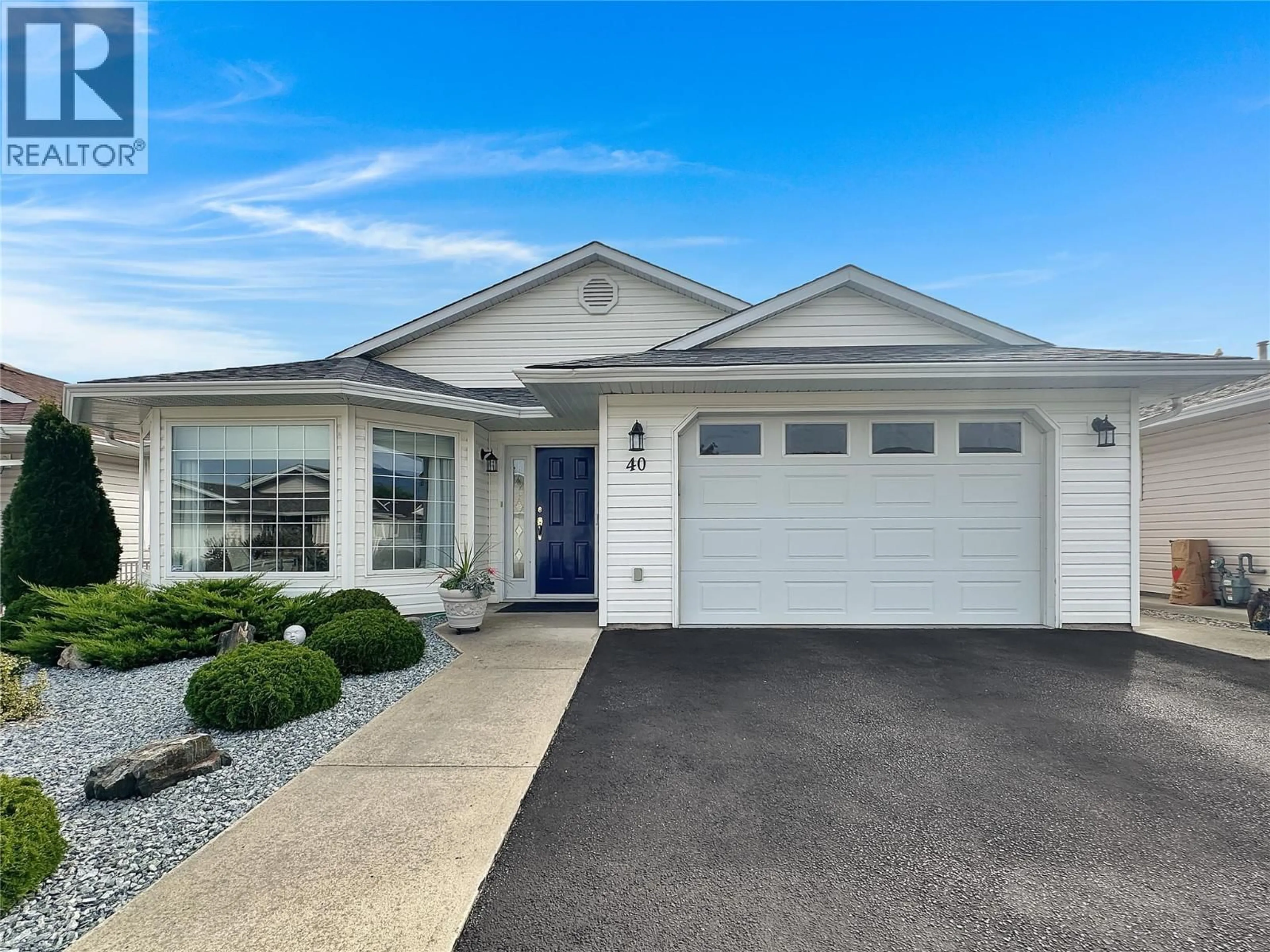 Home with vinyl exterior material, street for 40 - 6526 TUCELNUIT DRIVE, Oliver British Columbia V0H1T3